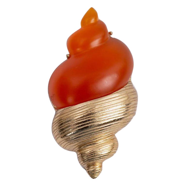 Spilla Dior conchiglia placcata in argento con resina arancione