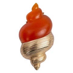 Spilla Dior conchiglia placcata in argento con resina arancione