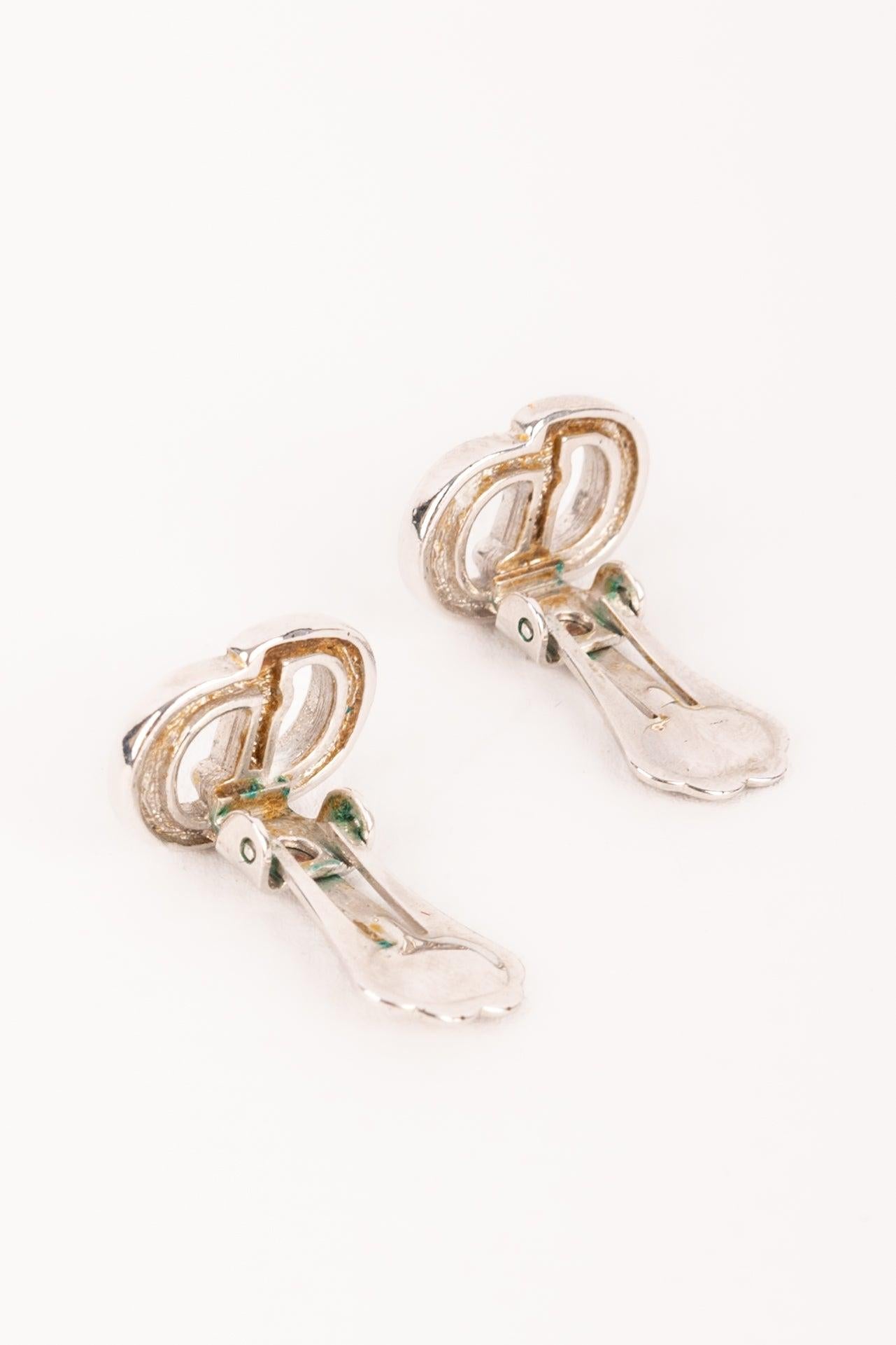 Donna Orecchini a clip argentati Dior in vendita