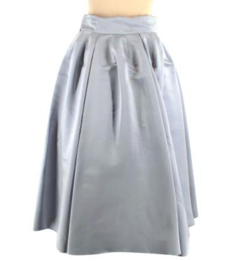 Dior Metallic Blue Pleated Silk Midi Skirt

Dior Pleated Black Silk Skirt

- Mid weight 
- Fluid satin 
- Pleated body 
- Zip fastening 
- Fully lined 

Materials:
100% Silk 

Made in France 

Dry clean only 

PLEASE NOTE, THESE ITEMS ARE PRE-OWNED