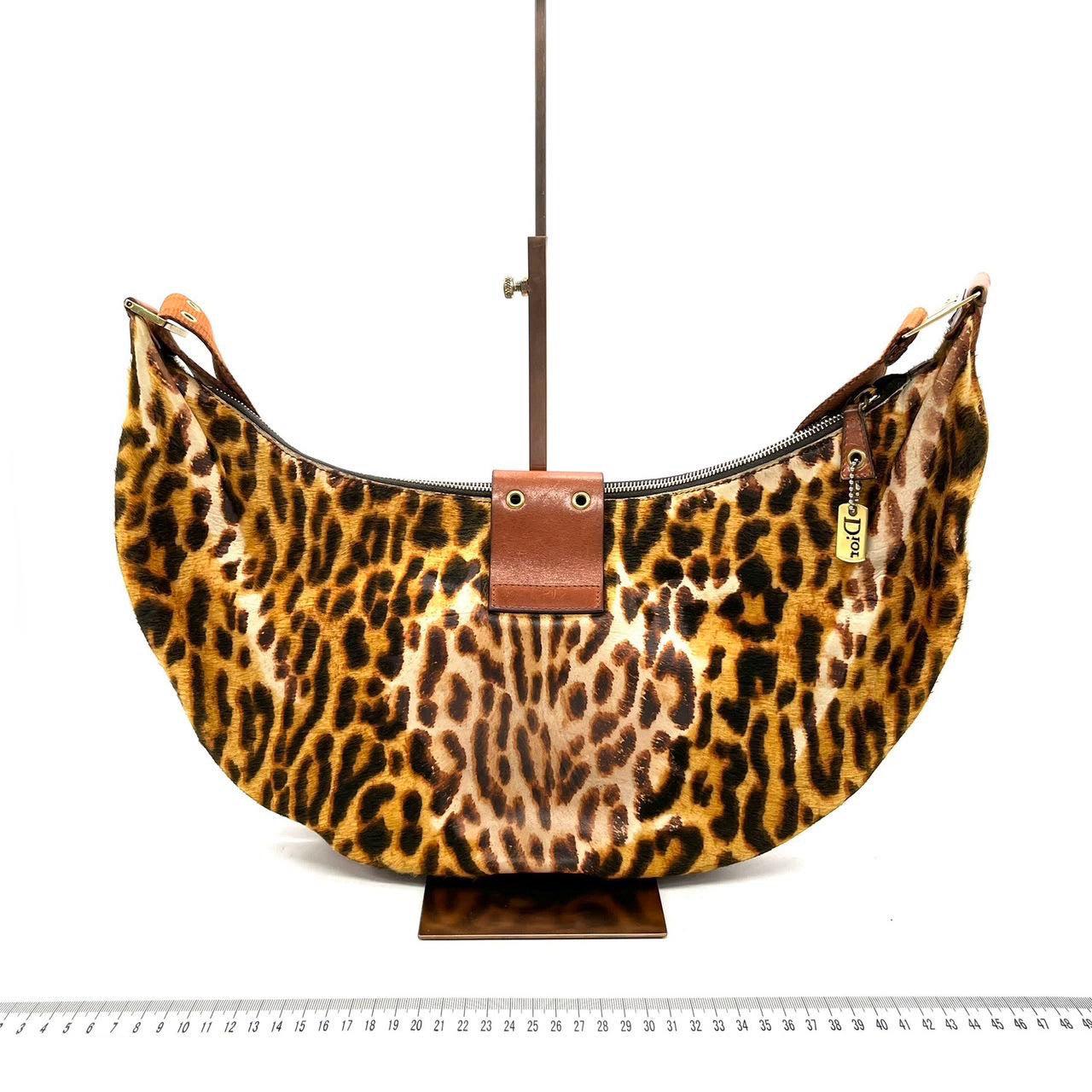Dior Street Chic Hobo Leopard Print Pony-hair Calfskin
 These are professional photos of the actual bag offered by Luxbags.
 John Galliano Era Dior Street Chic Hobo in stunning leopard print crafted from pony-hair style calfskin with canvas strap.