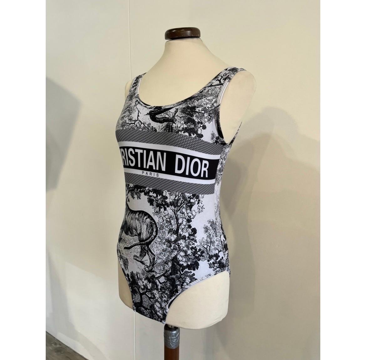 Black Dior swimsuit.