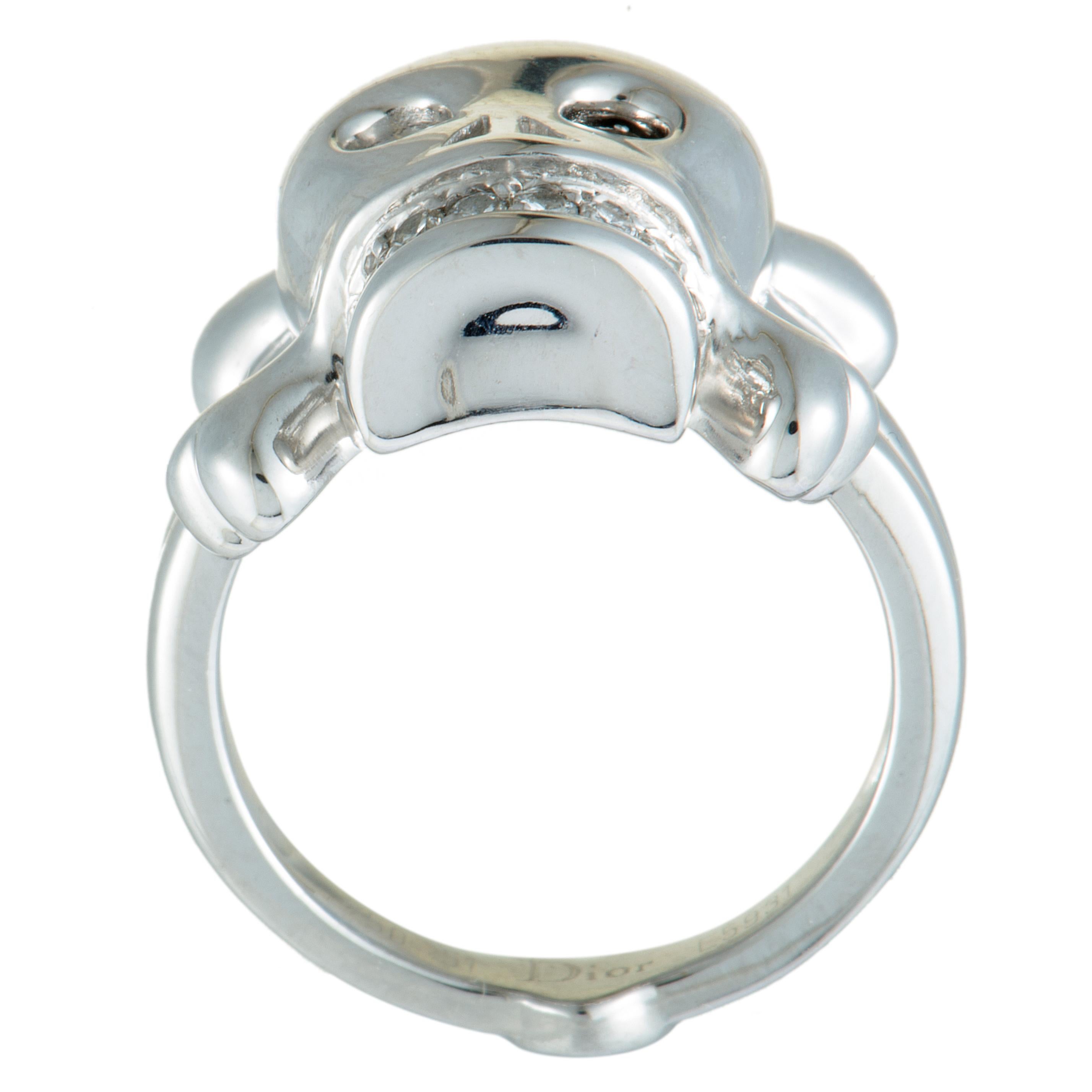 Extraordinarily designed for the exceptional “Tête de Mort” collection, this eye-catching Dior ring boasts an incredibly offbeat skull motif, offering a stunningly fashionable look. The ring is splendidly crafted from 18K white gold and it is