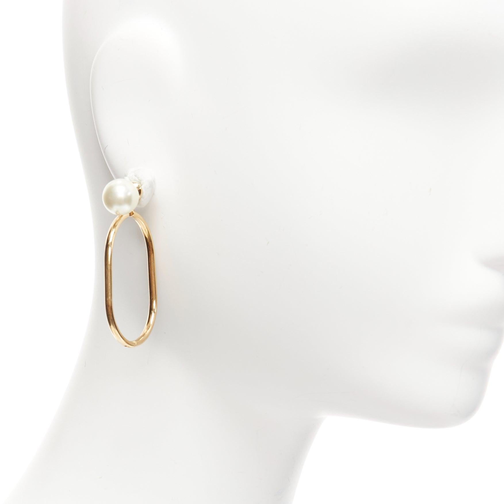 DIOR Tribale double pearl gold large oval hoop statement stud earrings pair
Reference: AAWC/A00906
Brand: Dior
Collection: Tribale
Material: Faux Pearl, Metal
Color: Gold, Pearl
Pattern: Solid
Closure: Pin
Lining: Gold Metal
Extra Details: Discreet