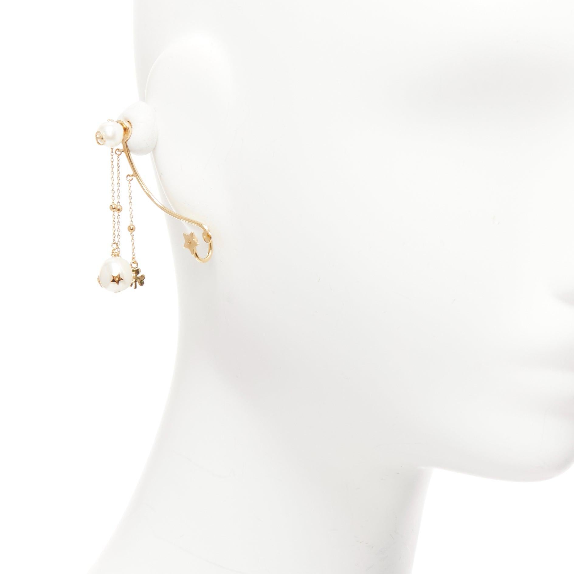 DIOR Tribales gold metal CD logo star pearl pin ear cuff earring Single
Reference: AAWC/A00904
Brand: Dior
Designer: Maria Grazia Chiuri
Collection: Tribales
Material: Metal, Faux Pearl
Color: Gold, Pearl
Pattern: Solid
Closure: Pin
Extra Details: