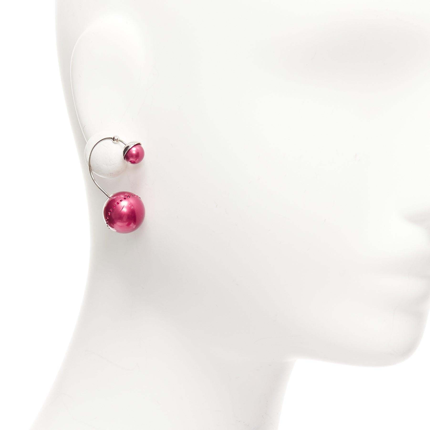 DIOR Tribales pealescent red faux pearls crystal orbital pin earrings Pair
Reference: AAWC/A01057
Brand: Dior
Material: Faux Pearl
Color: Red, Silver
Pattern: Crystals
Closure: Pin

CONDITION:
Condition: Fair, this item was pre-owned and is in fair