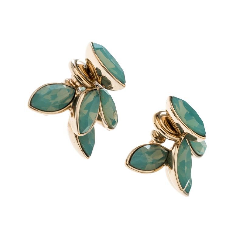 These Dior Tribale earrings are perfect for gifting your loved ones! They are brilliantly crafted from gold-tone metal and styled in the shape of a flower, the petals of which are encrusted with turquoise crystals. Pair them with a simple,