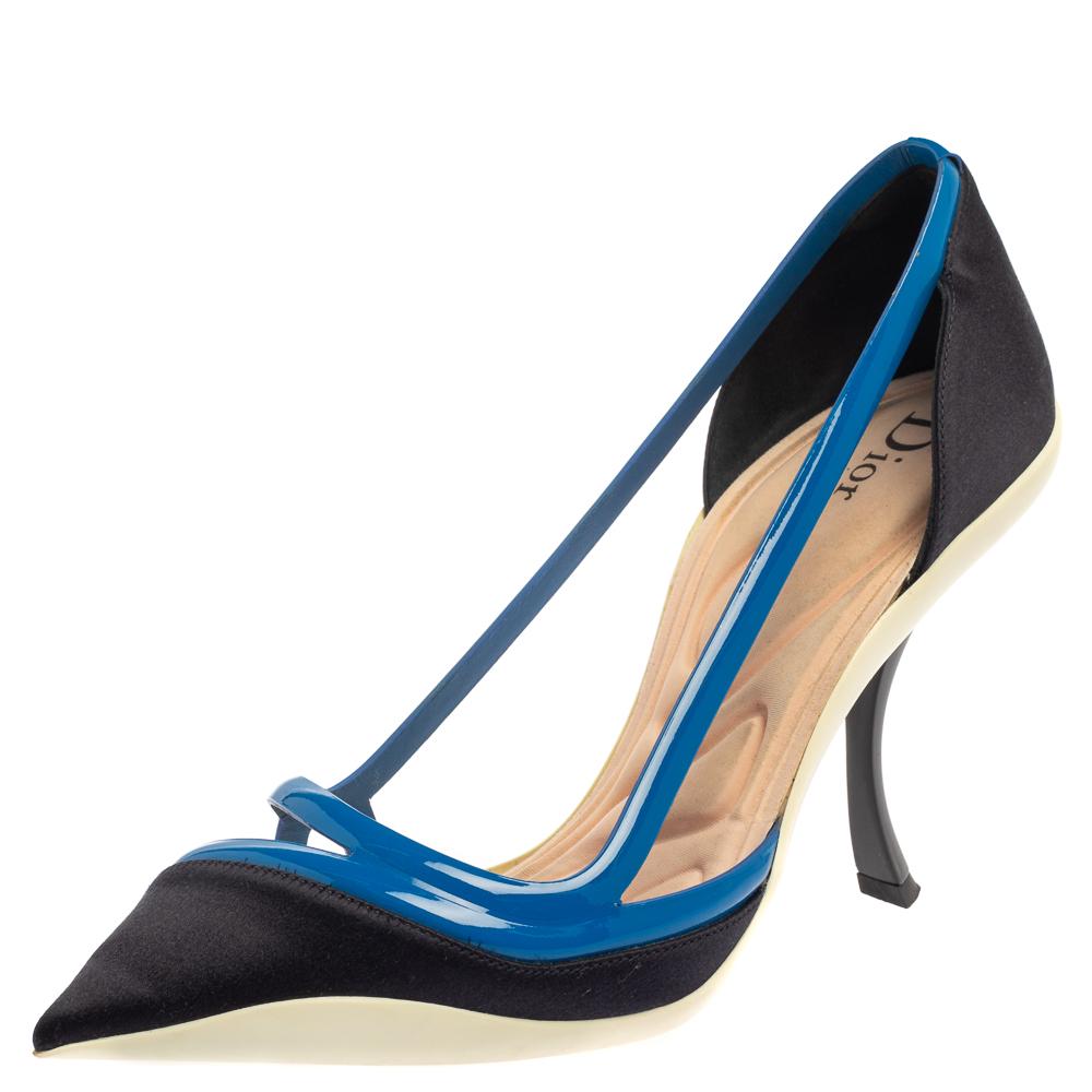 You'll definitely receive compliments wherever you go when you step out in these lovely pumps from Dior. They are crafted from patent leather and satin and feature pointed toes and cut-out vamps. They come equipped with comfortable fabric-lined