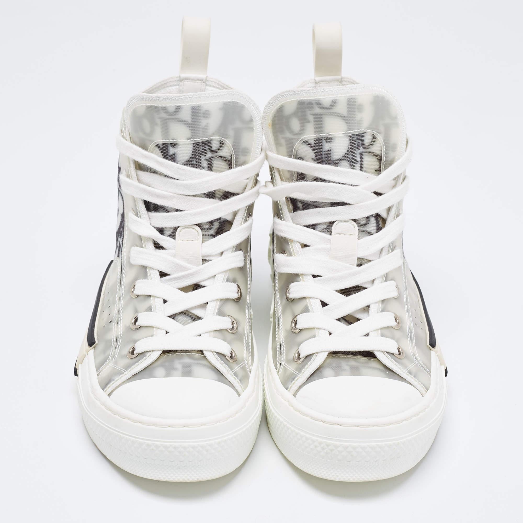 Add a statement appeal to your outfit with these Dior sneakers. Made from premium materials, they feature lace-up vamps, and relaxing footbeds. The rubber sole of this pair aims to provide you with everyday ease.

