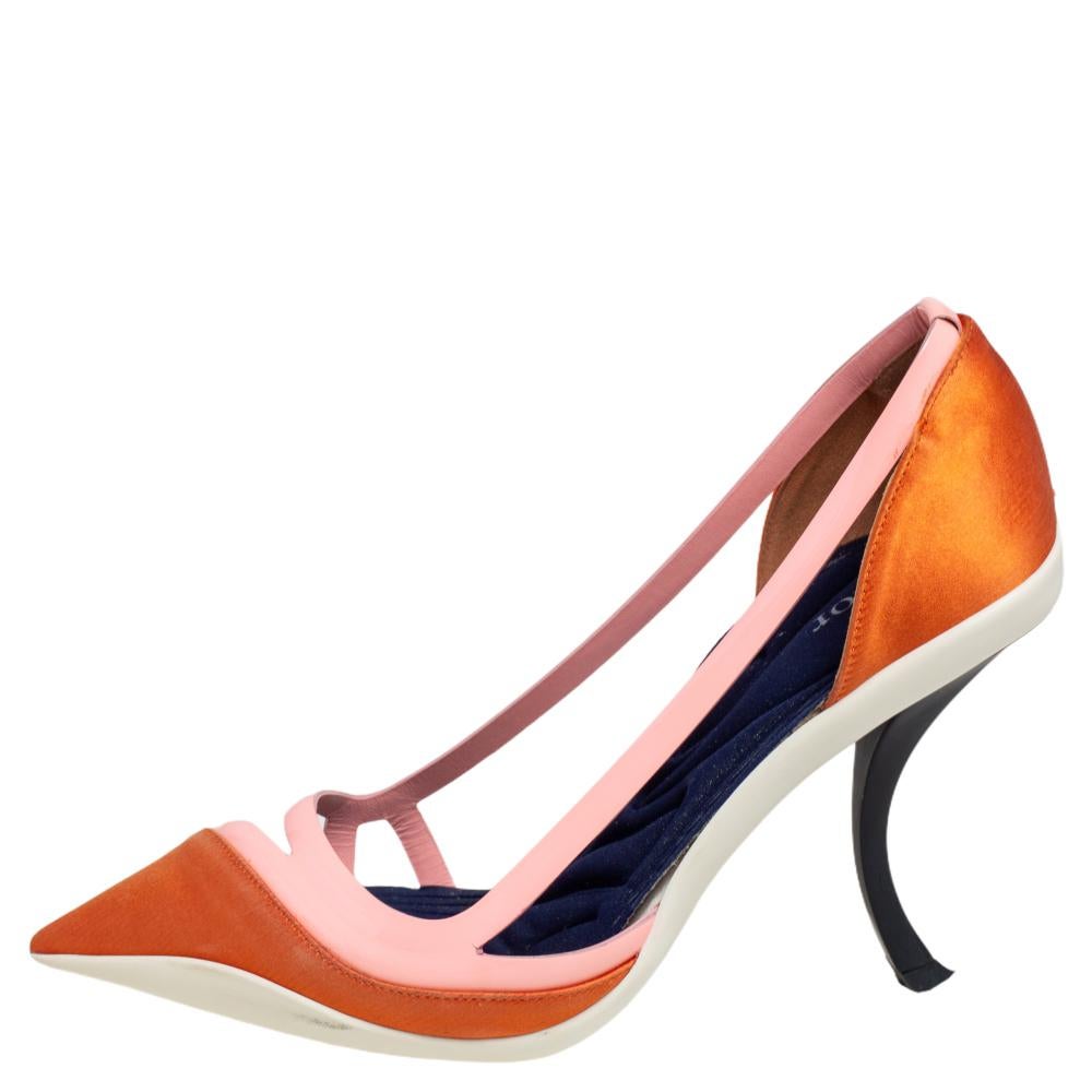 You'll definitely receive compliments wherever you go when you step out in these lovely pumps from Dior. They are crafted from patent leather and satin and feature pointed toes and cut-out vamps. They come equipped with comfortable fabric-lined