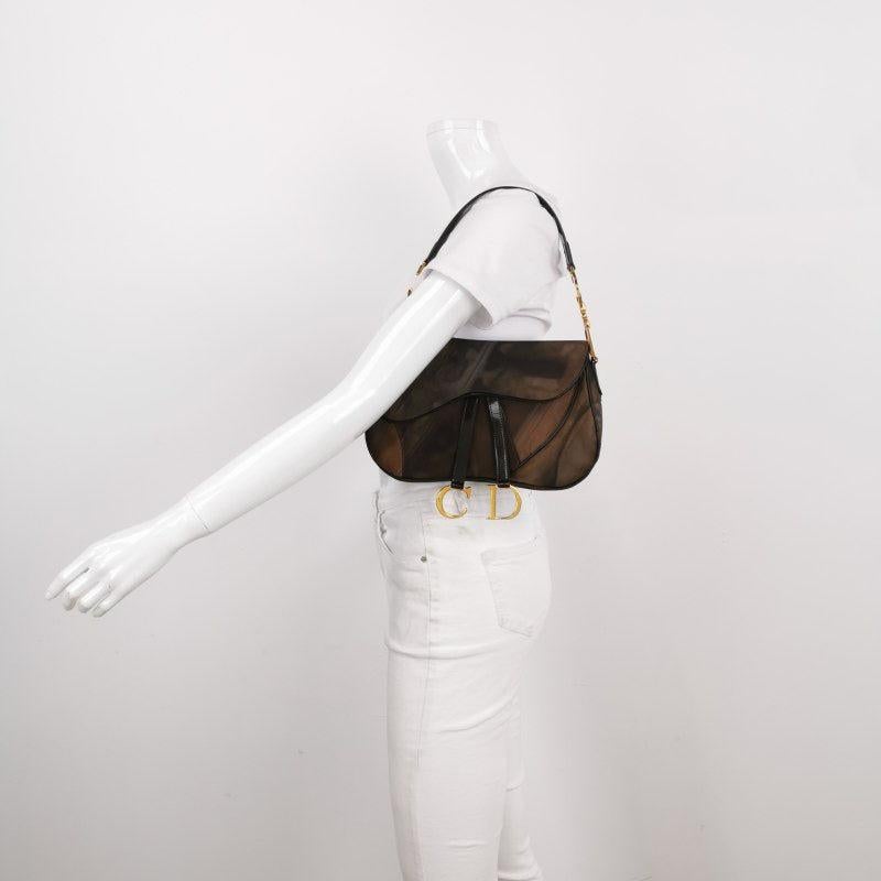 Dior Vintage Double Saddle Printed Nylon Shoulder Bag
 These are professional photos of the actual bag.
 Condition: Good 
 This preloved/ preowned Dior double saddle bag is in good condition with moderate to heavy signs of use. Light stains on the