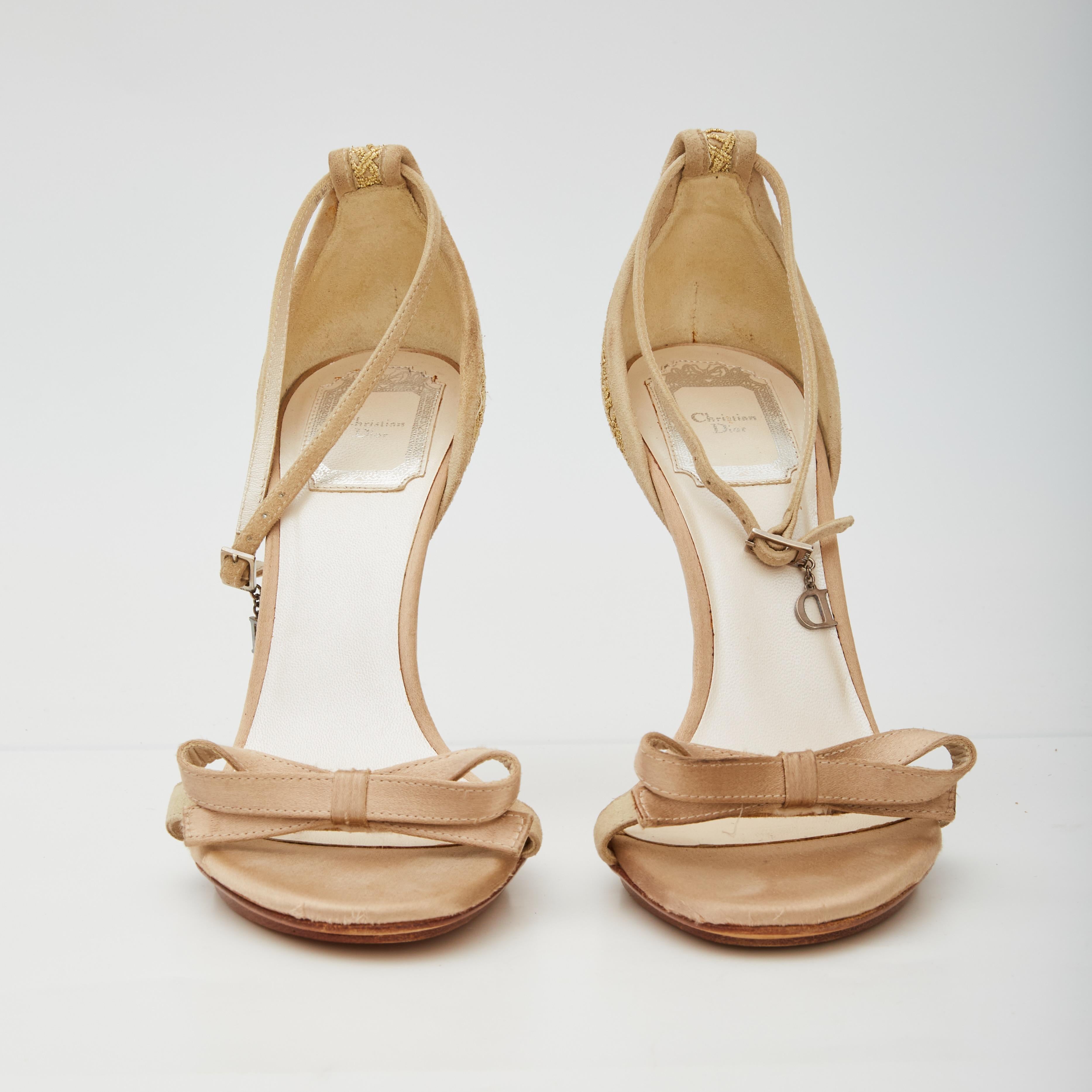 COLOR: Gold
MATERIAL: Silk embellished uppers/leather bottoms
SIZE: 37 EU / 6 US
HEEL HEIGHT: 100 mm / 4”
COMES WITH: Dust bag and box 
CONDITION: Very good - looks never used. Like new with the exception of discoloration marks to the side of one