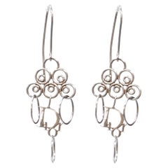 DIOR Vintage Y2K silver tribal spiral logo charm dangling earring