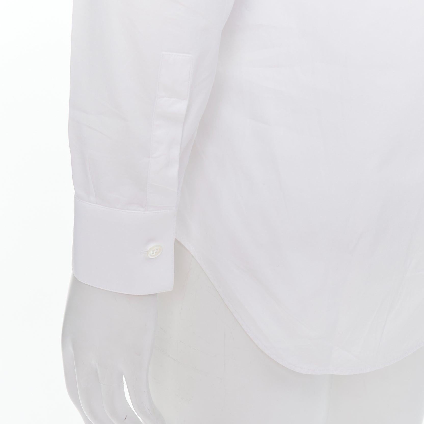 DIOR white 100% cotton shoulder darts plain dress shirt EU39 M
Reference: LACG/A00437
Brand: Dior
Material: Cotton
Color: White
Pattern: Solid
Closure: Button
Extra Details: Darted shoulders.
Made in: Italy

CONDITION:
Condition: Very good, this
