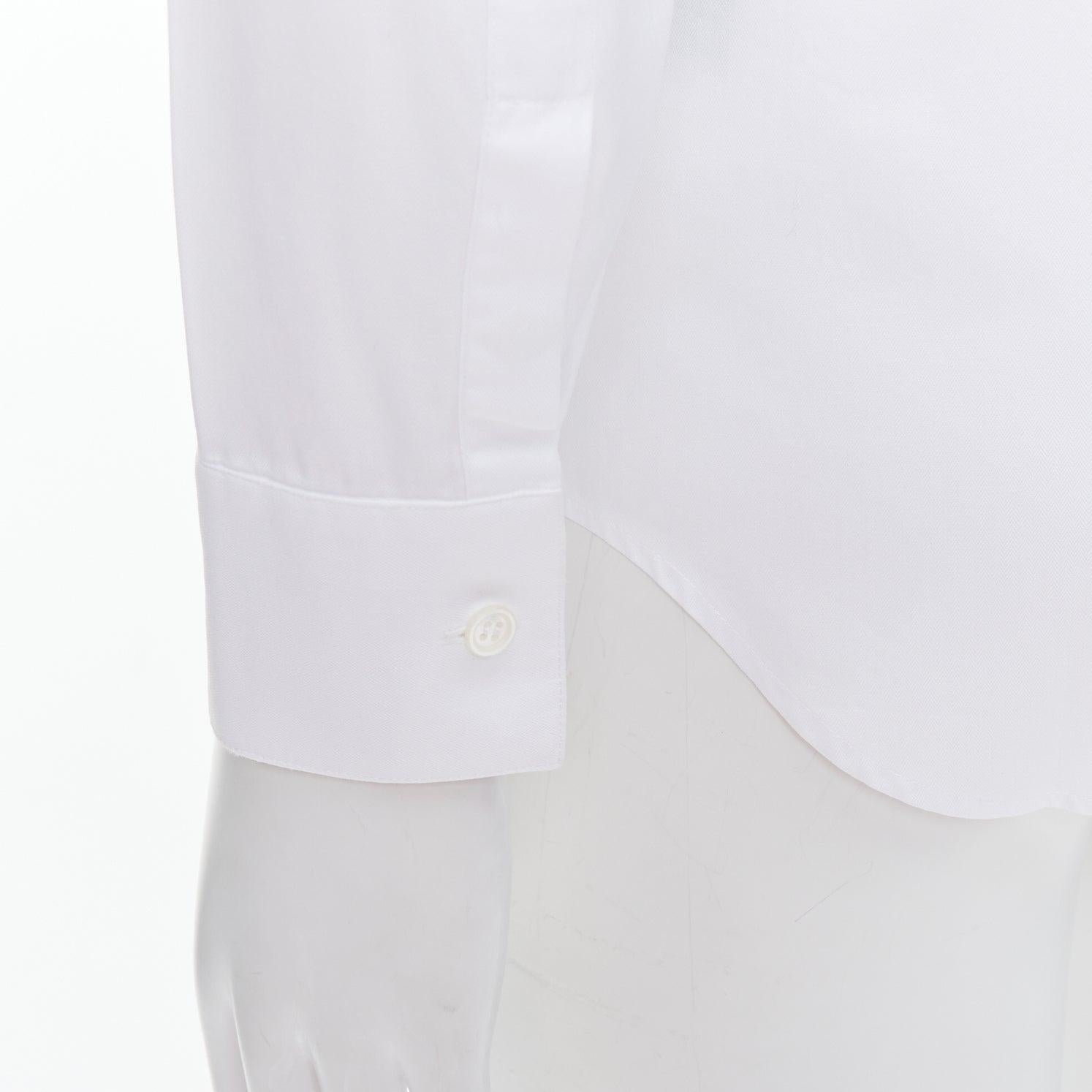 DIOR white 100% cotton shoulder darts plain dress shirt EU39 M
Reference: LACG/A00438
Brand: Dior
Material: Cotton
Color: White
Pattern: Solid
Closure: Button
Extra Details: Shoulder darts.
Made in: Italy

CONDITION:
Condition: Very good, this item