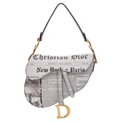 Used Dior White And Black Calfskin Newspaper Print Saddle Bag