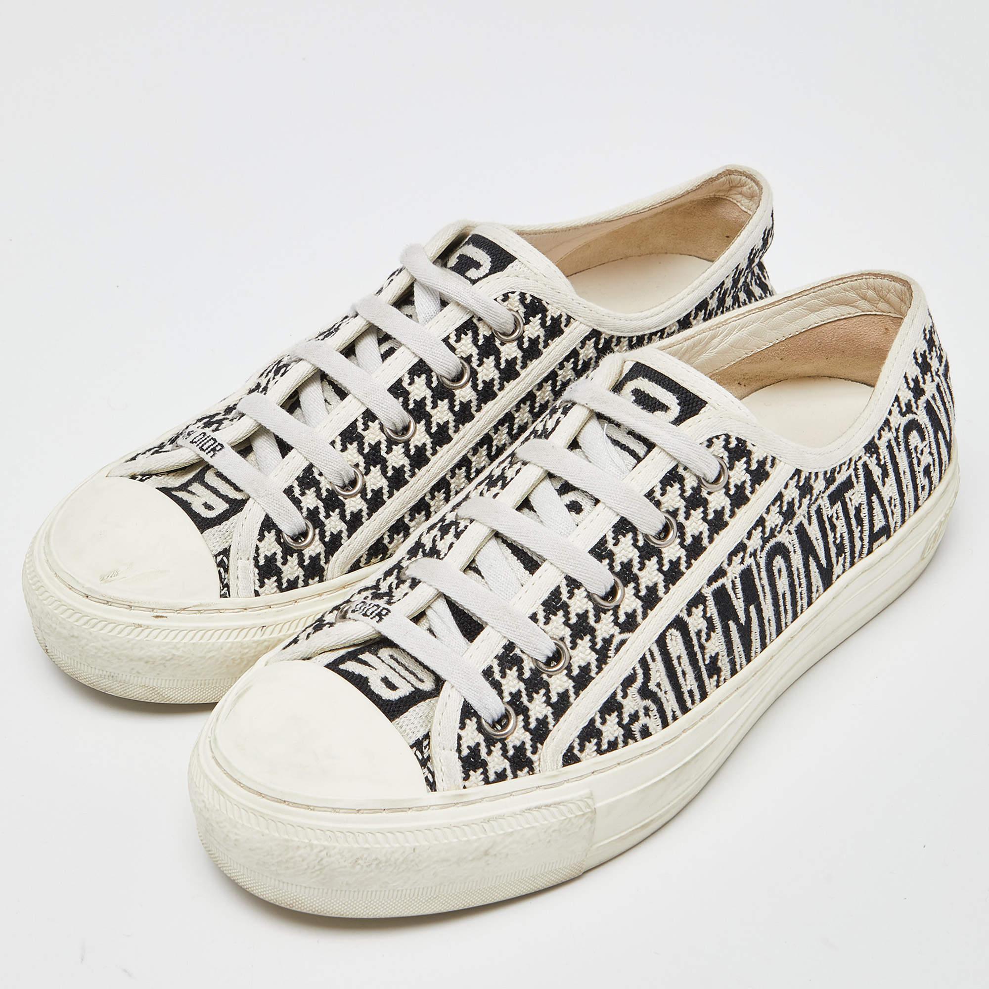 Add a statement appeal to your outfit with these Dior sneakers. Made from embroidered canvas, they feature lace-up vamps, a brand signature on the uppers, and comfortable insoles. The rubber sole of this pair aims to provide you with everyday ease.

