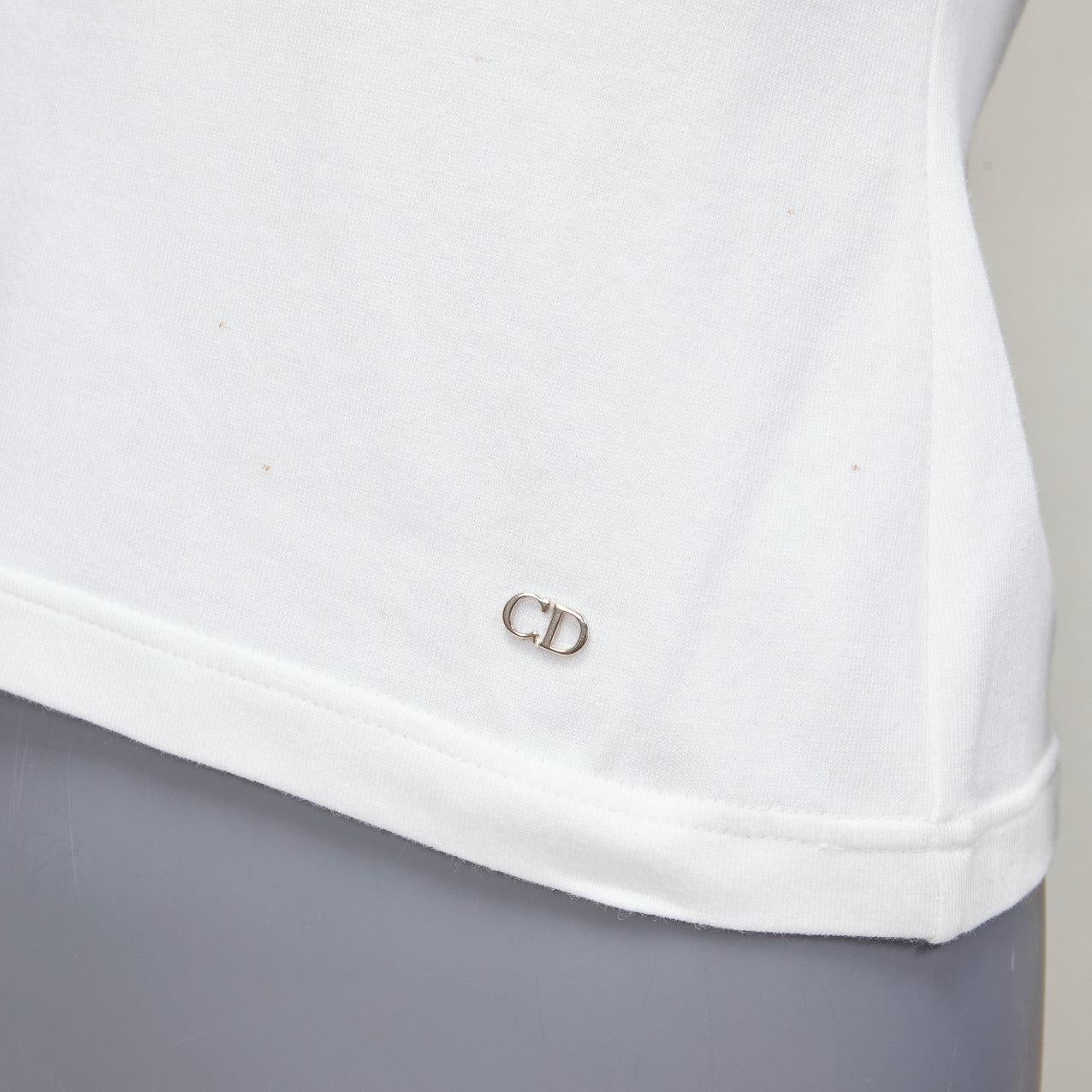 DIOR white cotton blend CD silver charm high strap tank top FR36 XS
Reference: AAWC/A01136
Brand: Dior
Designer: Maria Grazia Chiuri
Material: Cotton, Blend
Color: White
Pattern: Solid
Closure: Pullover
Extra Details: CD logo plate at left hem.
Made