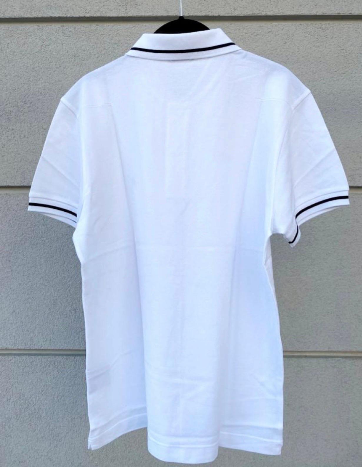 Dior polo t-shirt. 
100% white cotton.
Featuring a small bee detail and short sleeves.
Size L. Measurements: shoulders 45 cm, bust 51 cm, length 75 cm, sleeve 20 cm.
Perfect, good as new.
Born as man T-shirt but it can be worn by both genres.