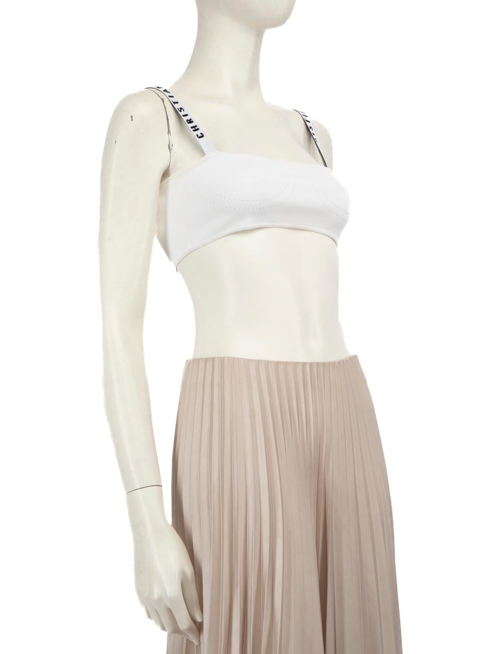 CONDITION is Very good. Minimal wear to the top is evident, there is mild discolouration around the underarms and the right side seam on this used Dior designer resale item.
 
 Details
 White
 Viscose
 Top
 Sleeveless
 Cropped
 Logo detail shoulder