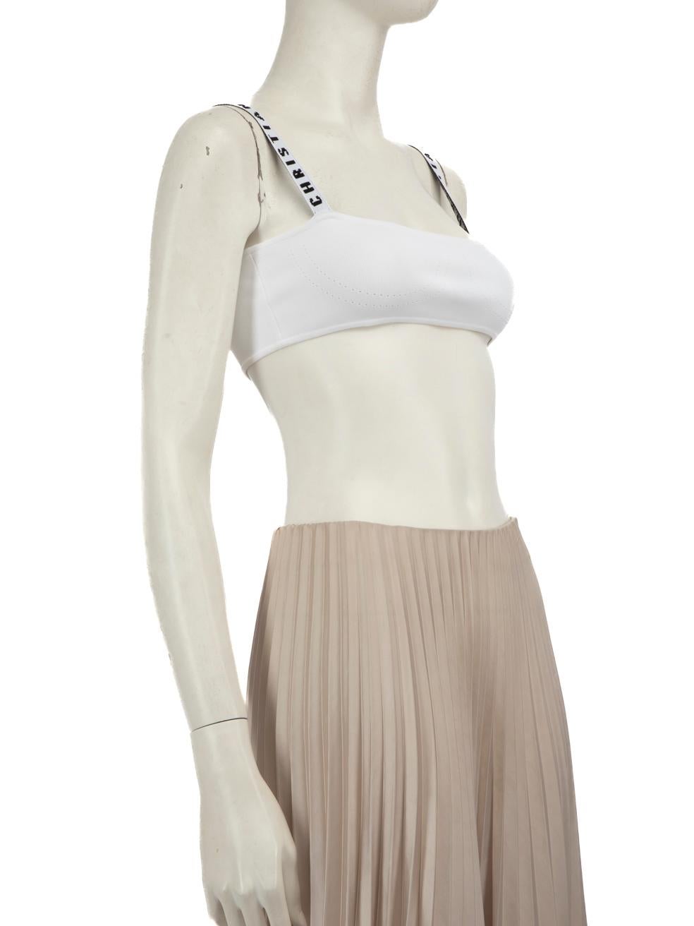 L'ÉTAT est très bon. L'usure minimale de la partie supérieure est évidente. Légère marque au centre de l'avant de cet article de revente Diordesigner d'occasion. 
 Détails
 Modèle : J'adior
 Blanc
 Viscose
 Top bralette
 Extensible
 Sans manches

