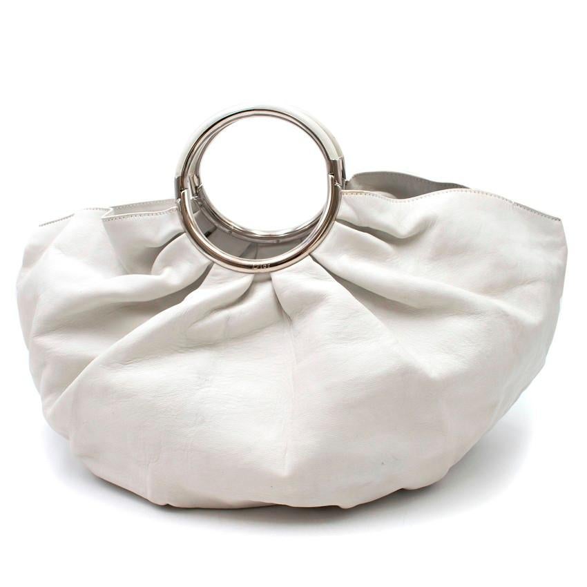 Dior White Bracelet Bag

-White leather bracelet bag 
-Silver toned hardware with leather handle
-Ruching around handles
-Dior embossed on handles
-Smaller pouch attached inside
-Grey lining

Please note, these items are pre-owned and may show signs