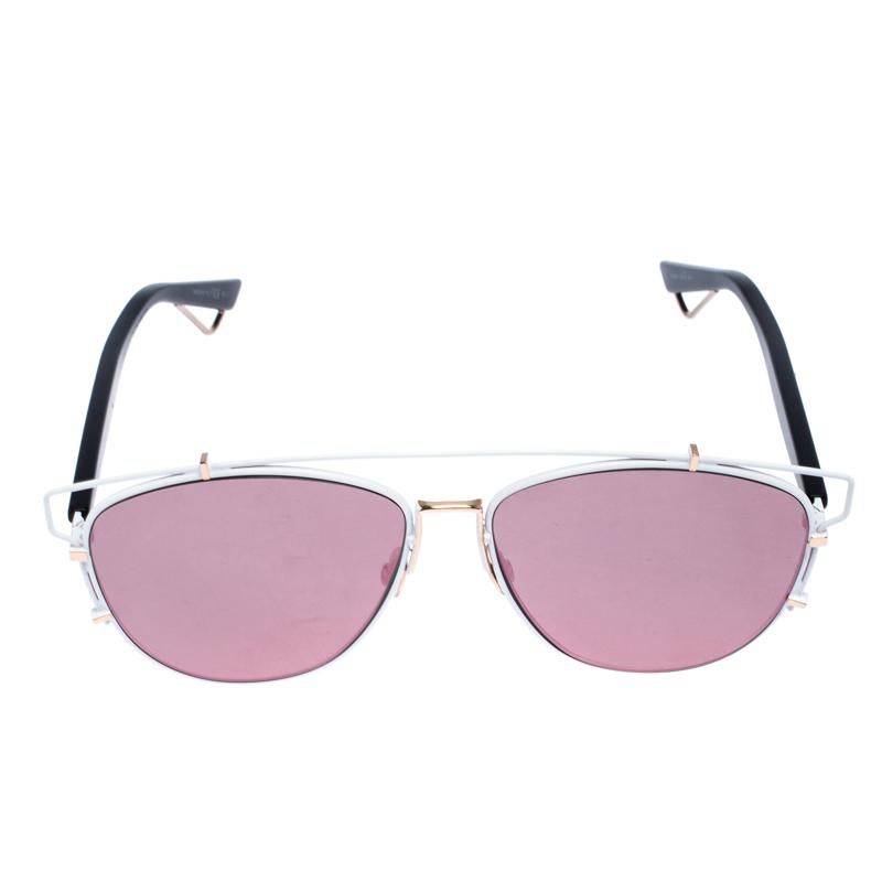 Dior never fails to create lush accessories, and these aviator sunglasses are no exception. These Technologic sunglasses are a classic pair with an edge. They are crafted from acetate and gold-tone metal and feature pink lenses. The hinges carry