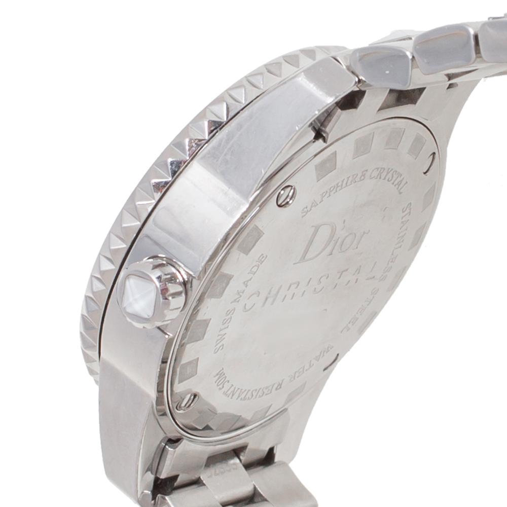 Here's a timepiece to not only assist you with the correct time but also elevate your style quotient. This Dior watch is from their Christal collection, and it is made of stainless steel. The white dial has elegant hour markers, three hands, and
