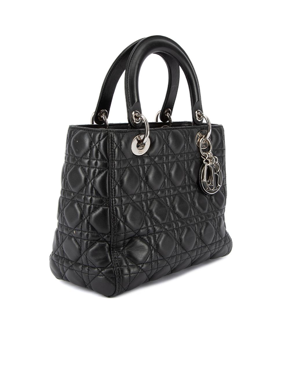 CONDITION is Very good. Minimal wear to bag is evident. Minimal wear the bag exterior leather where light marks and scuffs can be seen. There are some light scratches on the inner handle on this used Dior designer resale item.  Details  2016 Black