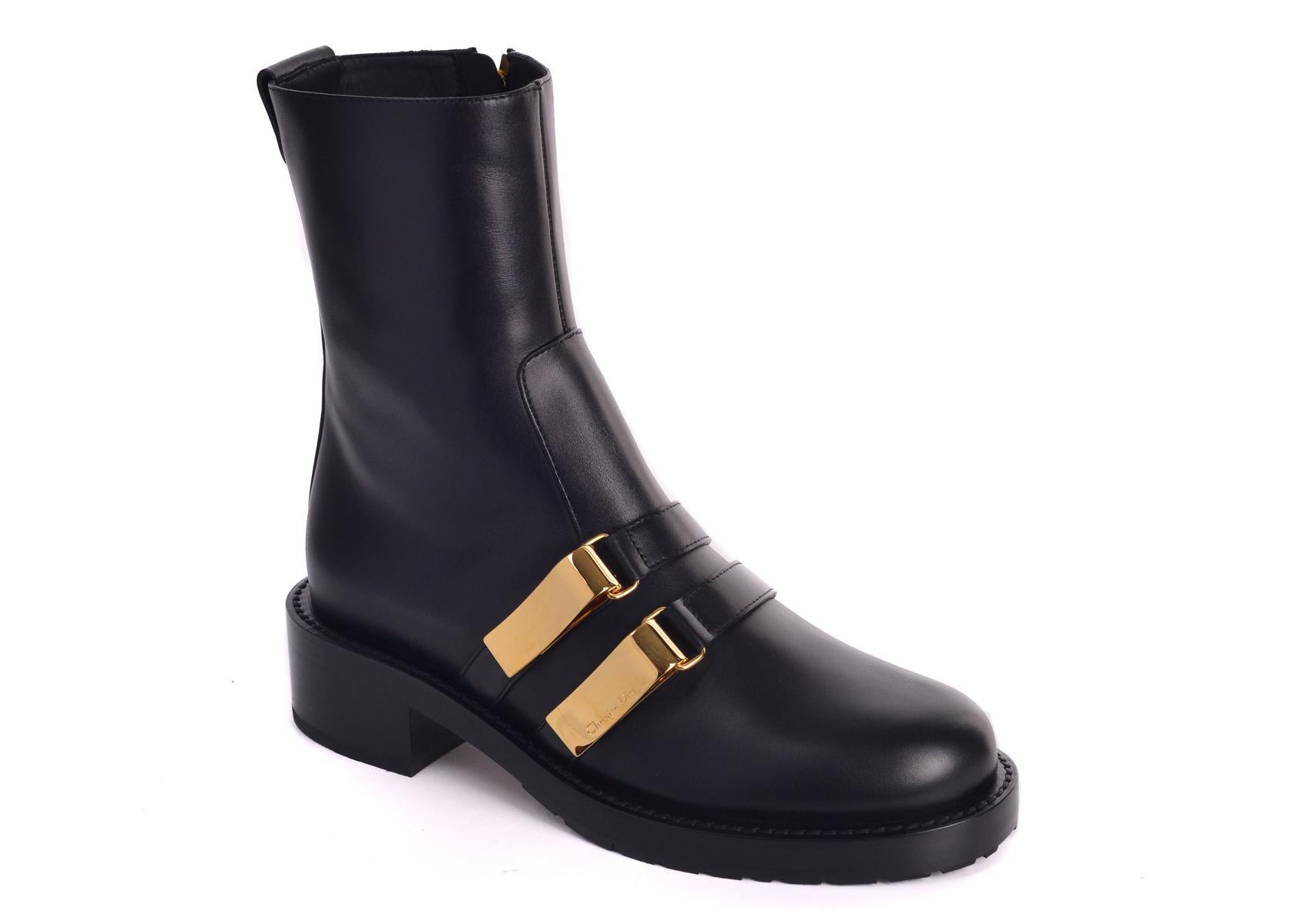 Christian Dior black leather D-Race ankle boots. These boots are the perfect execution of comfort and style with its chic sleek look. Perfect pair of boots for all around the season, pair with your leather jacket for an edgy feminine