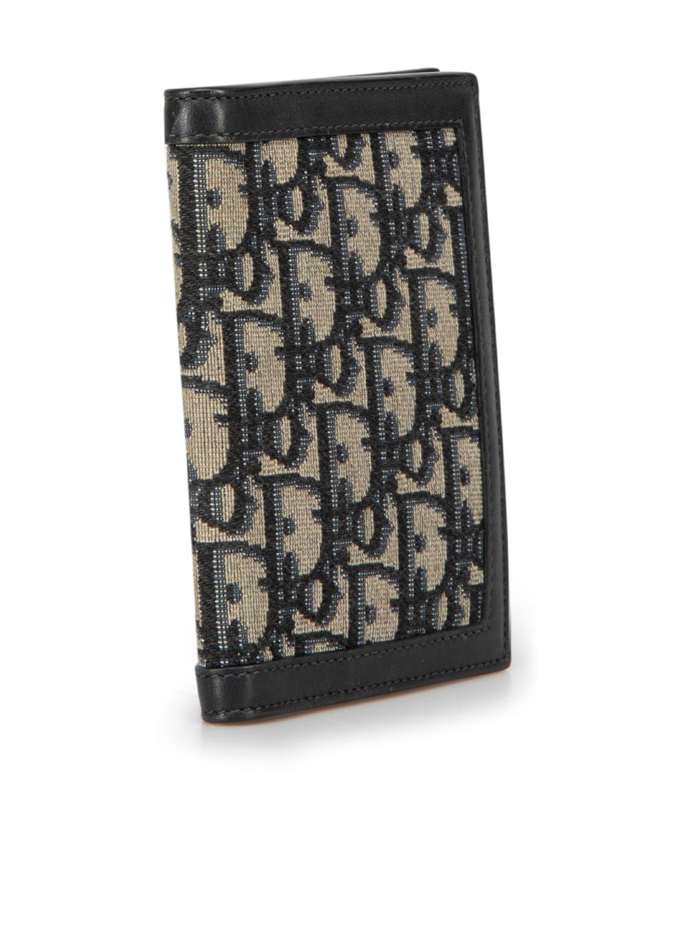 CONDITION is Very good. Minimal wear to wallet is evident. Minimal wear to leather lining with small scuffs on this used Christian Dior designer resale item. This item comes with original dust bag which has marks and