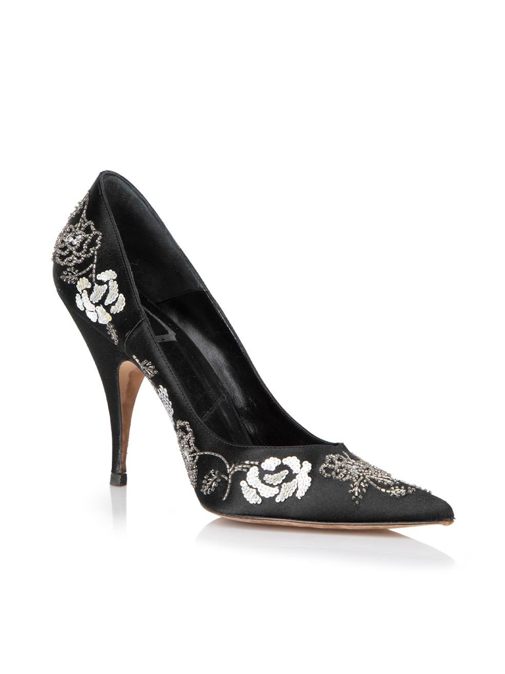 CONDITION is Very good. Minimal wear to heels is evident. Minimal wear to the satin exterior and the sequins. There is also a small scuff to the toe point of the left heel on this used Dior designer resale item. 
 
 Details
  Black
 Satin
 Slip on