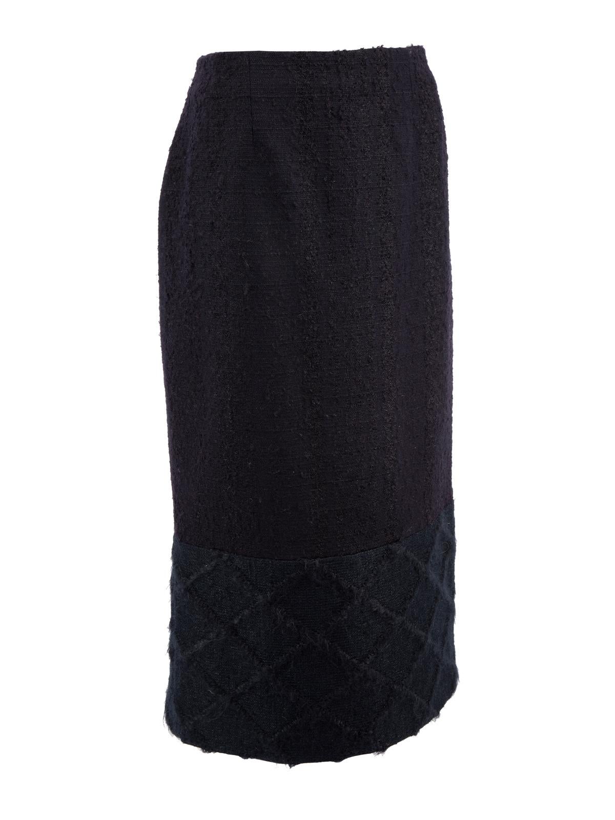 CONDITION is Very good. Minimal wear to skirt is evident. Overall wear to outer fabric, where pilling can be seen on this used Christian Dior designer resale item.   Details  Dark Navy Wool Tight fit Midi length Criss-cross pattern on hemline