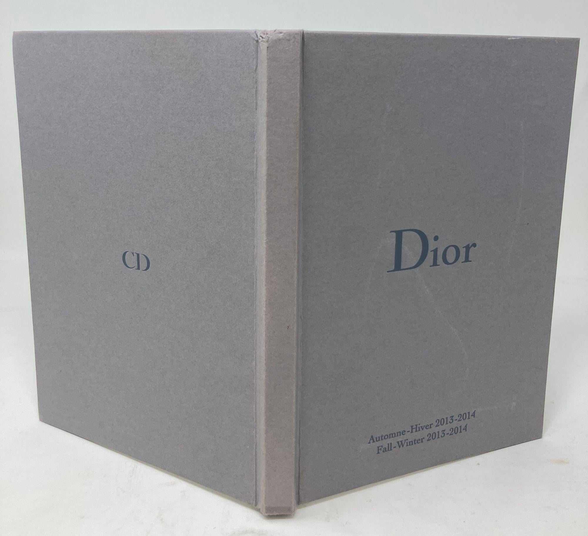 DIOR Women's Runway Show Lookbook Cruise Collection 2013-2014.
DIOR: Haute Couture Autumn/Winter 2013-2014.
In French and English text.
Hardcover small book.
Book is in good condition.
Binding is intact.
Pages are clean and clear.
No loose