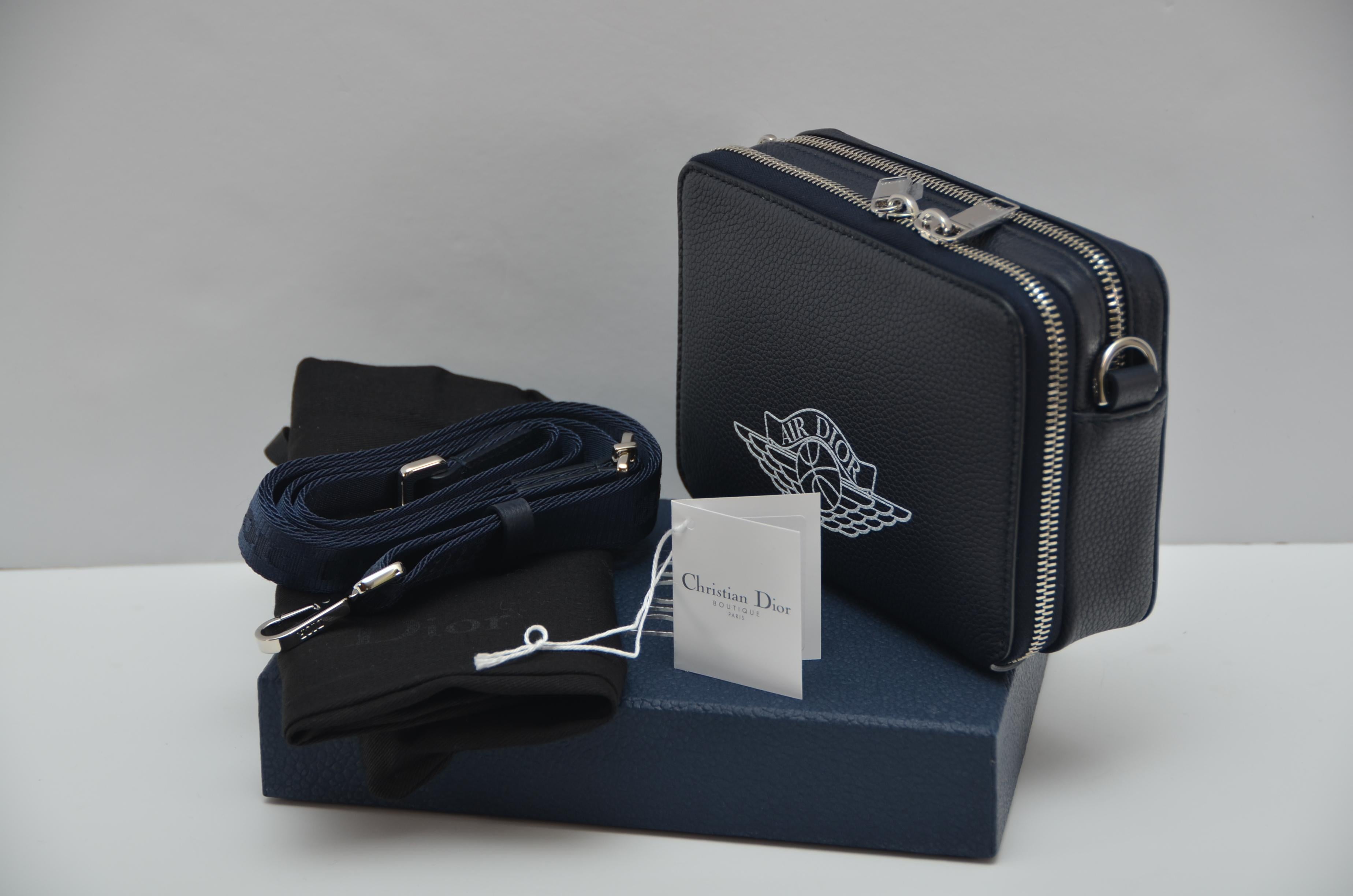 
100% guaranteed authentic 
Dior X Jordan AirDior Navy Crossbody Messenger Bag
For the Men’s Fall 2020 Runway show in Miami, Dior and Kim Jones partnered with Jordan Brand to unveil the limited-edition Air Jordan collaboration  

COLOUR: