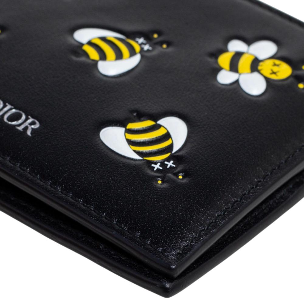 Dior kaws wallet hot sale