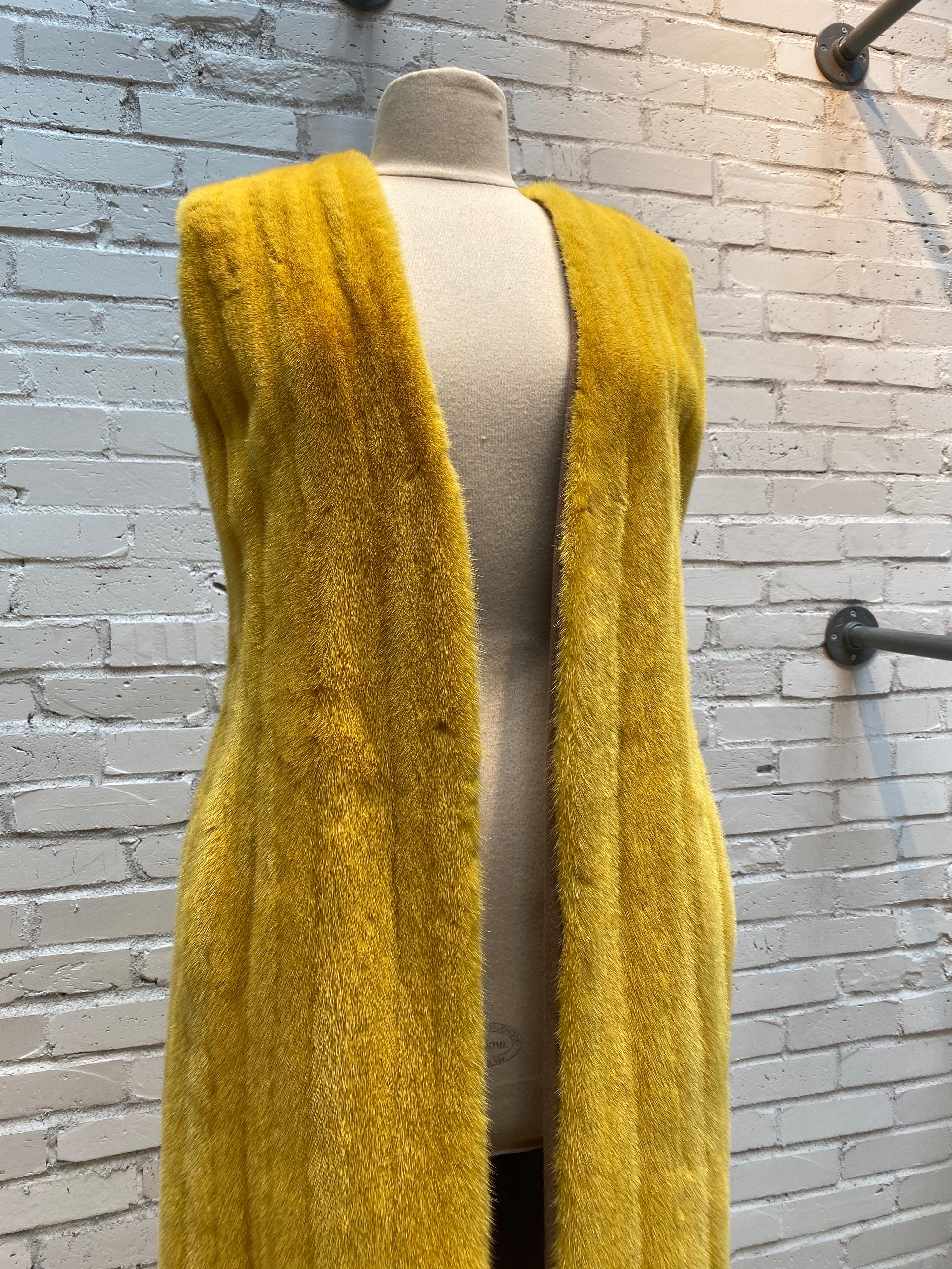 Length 48” marked size 4 
17” shoulder  
100% cashmere interior lining 
Beautiful full length yellow Mink vest by Dior. Purchased for over $40,000 at Nieman Marcus. Mint condition. Like new. Guaranteed authentic. 