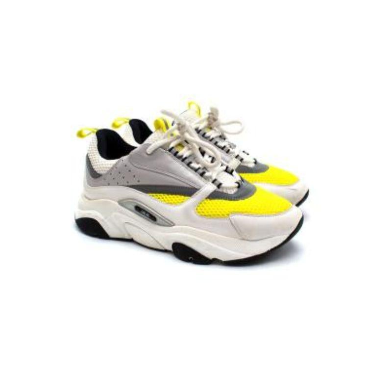 Dior Yellow & White B22 Sneakers

-Raised 'DIOR' signature on the side
-Round toe 
-White technical mesh
-White and silver smooth calfskin
-'DIOR' signature on the side
-Low-top
-Nylon tabs and lace-up closure
-Nylon and calfskin lining
-Sculpted