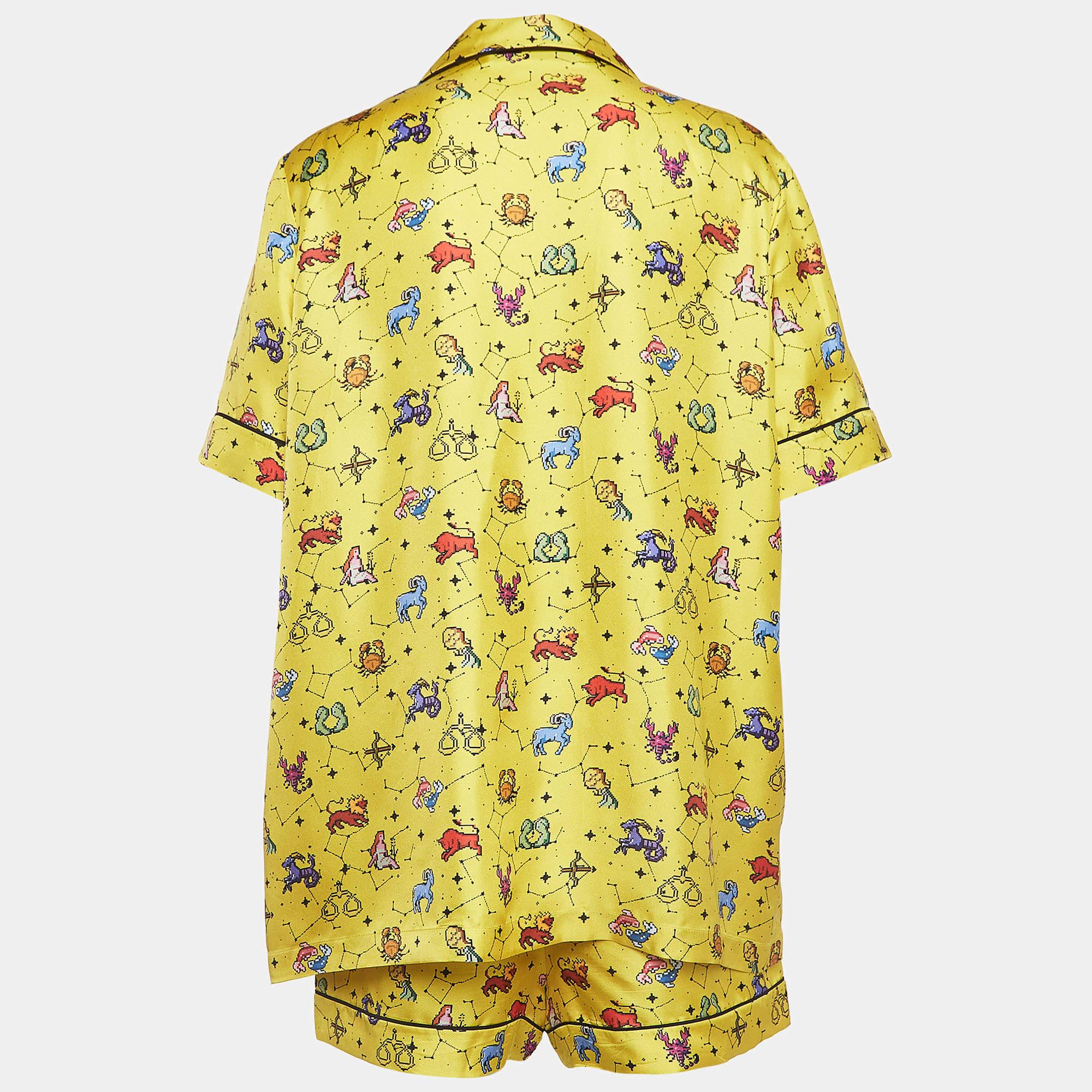In vibrant hues of yellow, the Dior shirt and shorts Set exudes celestial charm. Crafted from luxurious silk, the shirt features a striking zodiac print, while the coordinating shorts offer comfort and style. Perfect for those seeking