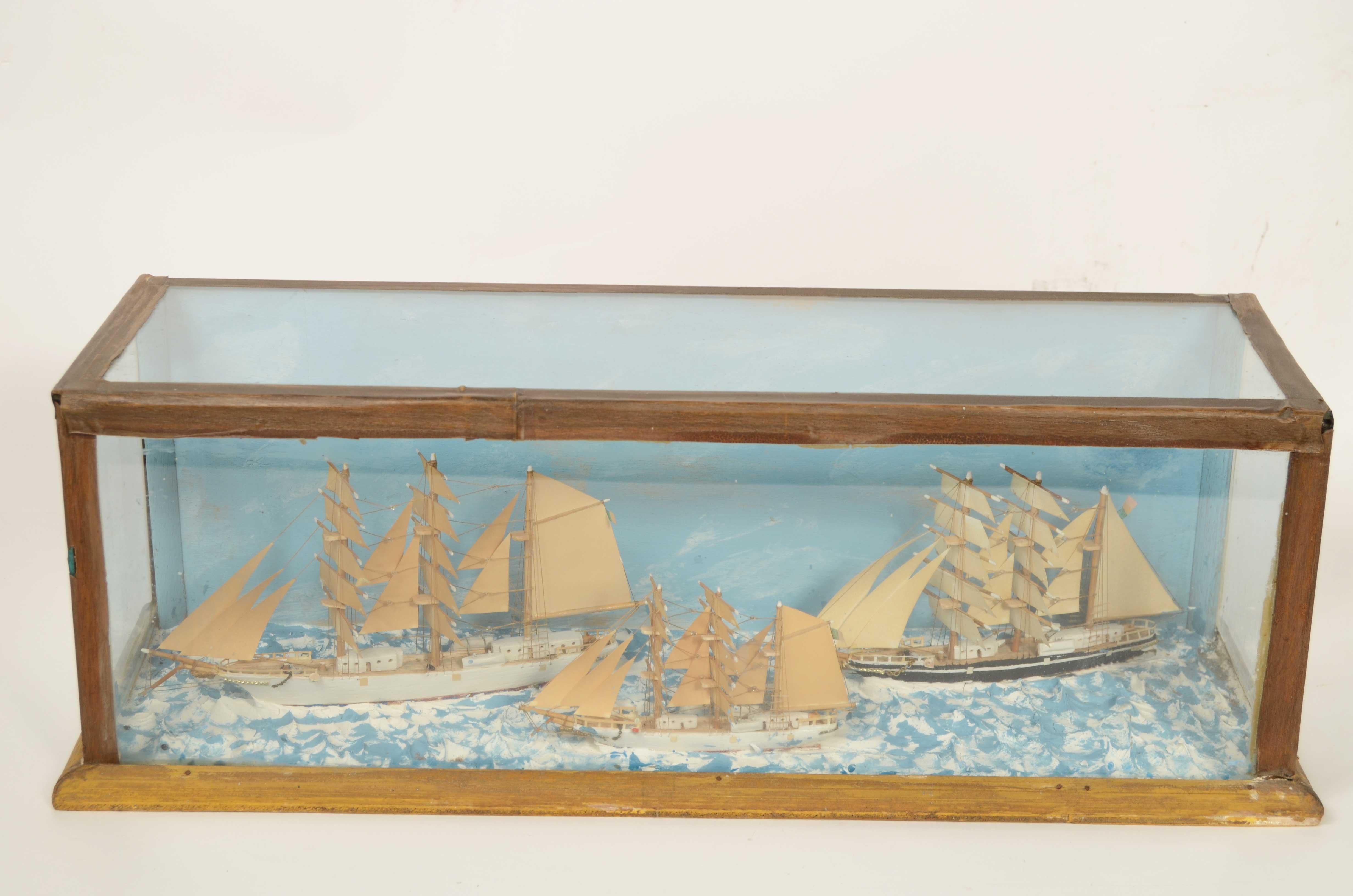 Early 20th Century Nautical diorama in glass case depicting 3 ships at sea Italy 1920s For Sale