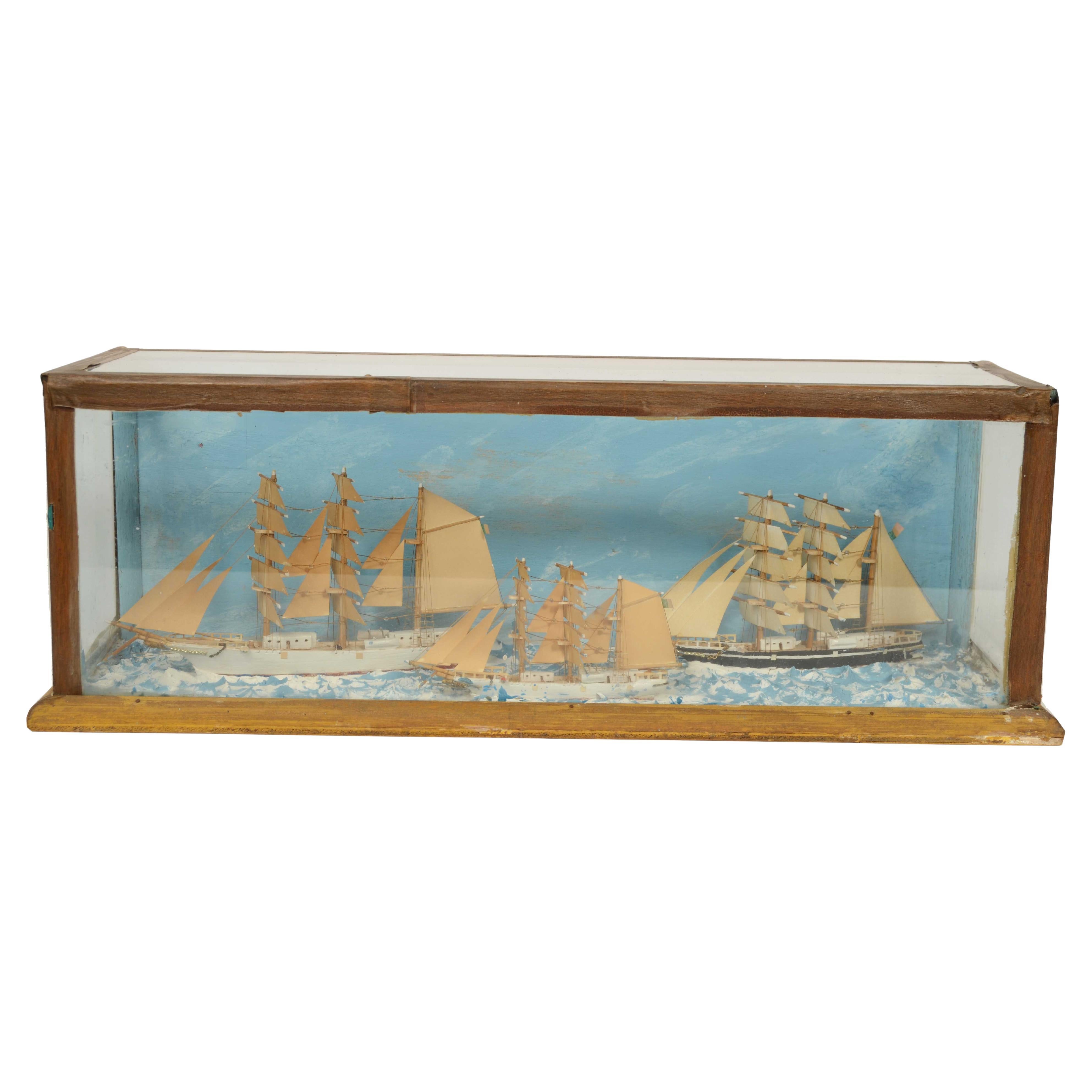 Nautical diorama in glass case depicting 3 ships at sea Italy 1920s For Sale