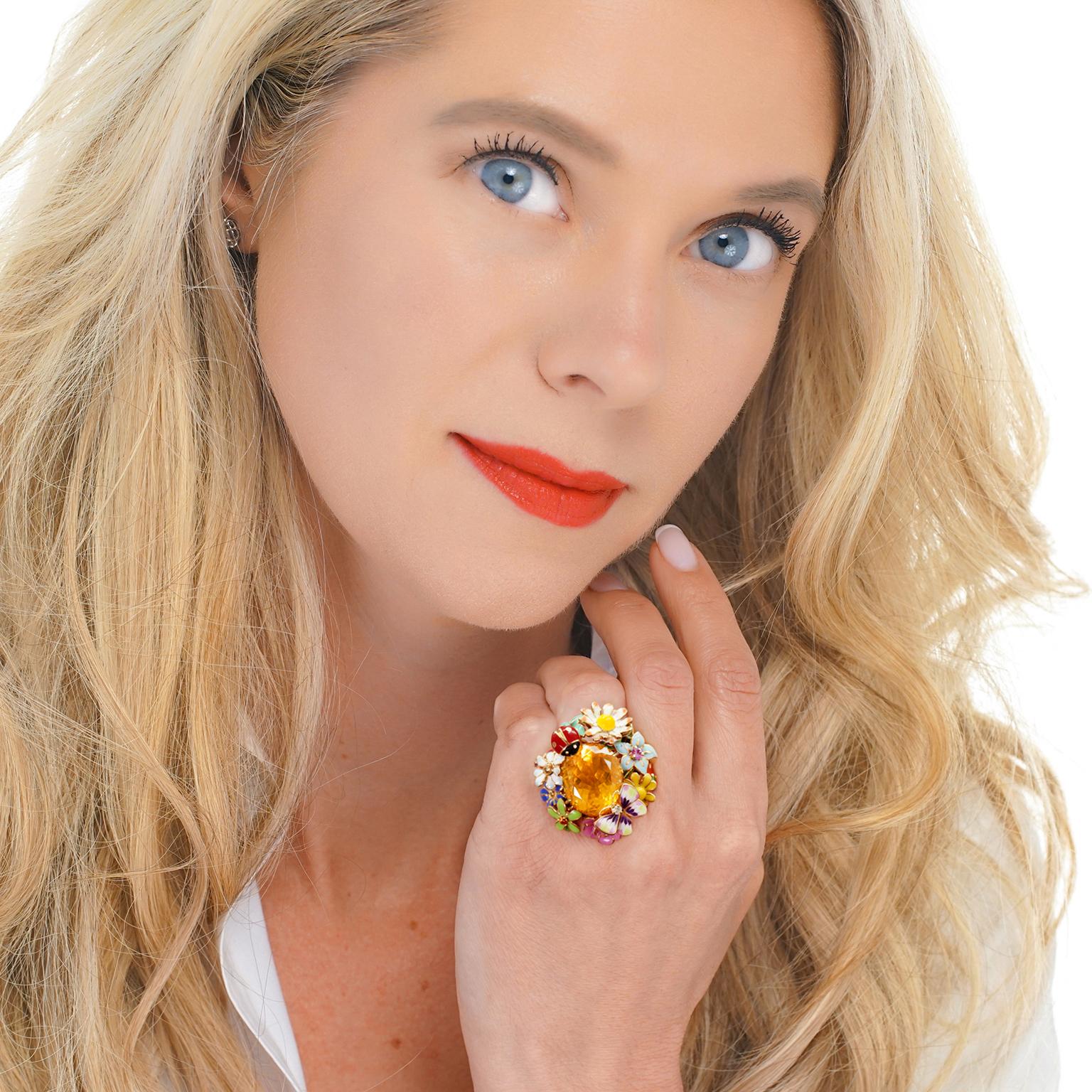 Circa 2006, 18k, by Victoire De Castellane for Dior, France. This Diorette ring is a spectacular garden of flowers in exquisite citrine, diamond, sapphire, amethyst, garnet, spessartite garnet and lacquer. The look is carefree Gallic charm at its