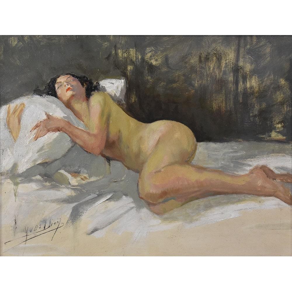 En la categoría Pinturas de desnudos femeninos aparece el desnudo de una mujer tumbada en una cama,

del siglo XX, años 30-40. Art Déco.

La obra es un cuadro pintado a mano a principios del siglo XX. Lleva un marco de madera lacada.

Firmado abajo