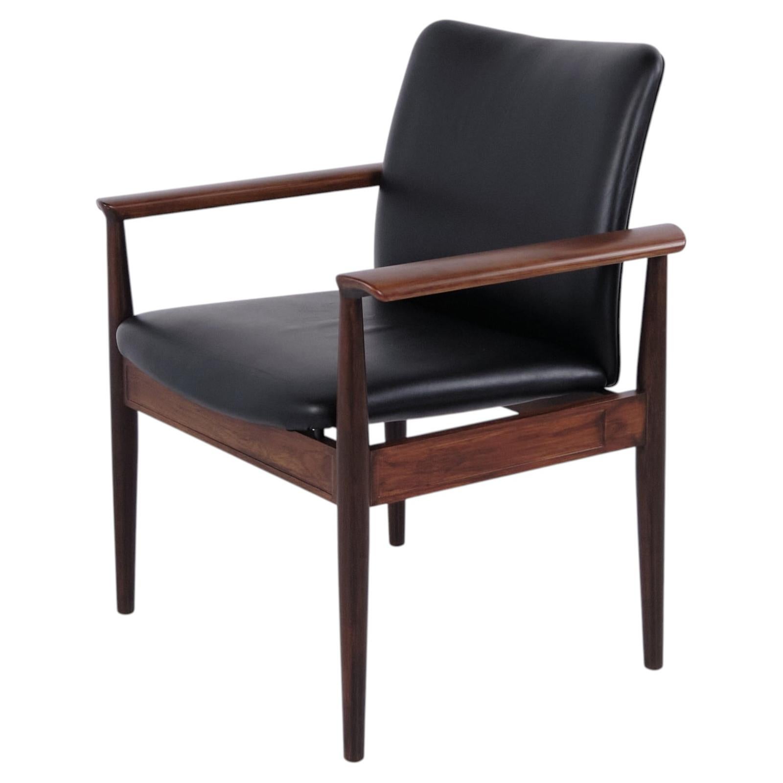 Diplomat 209 Armchair in Rosewood & Black Leather by Finn Juhl for France & Son