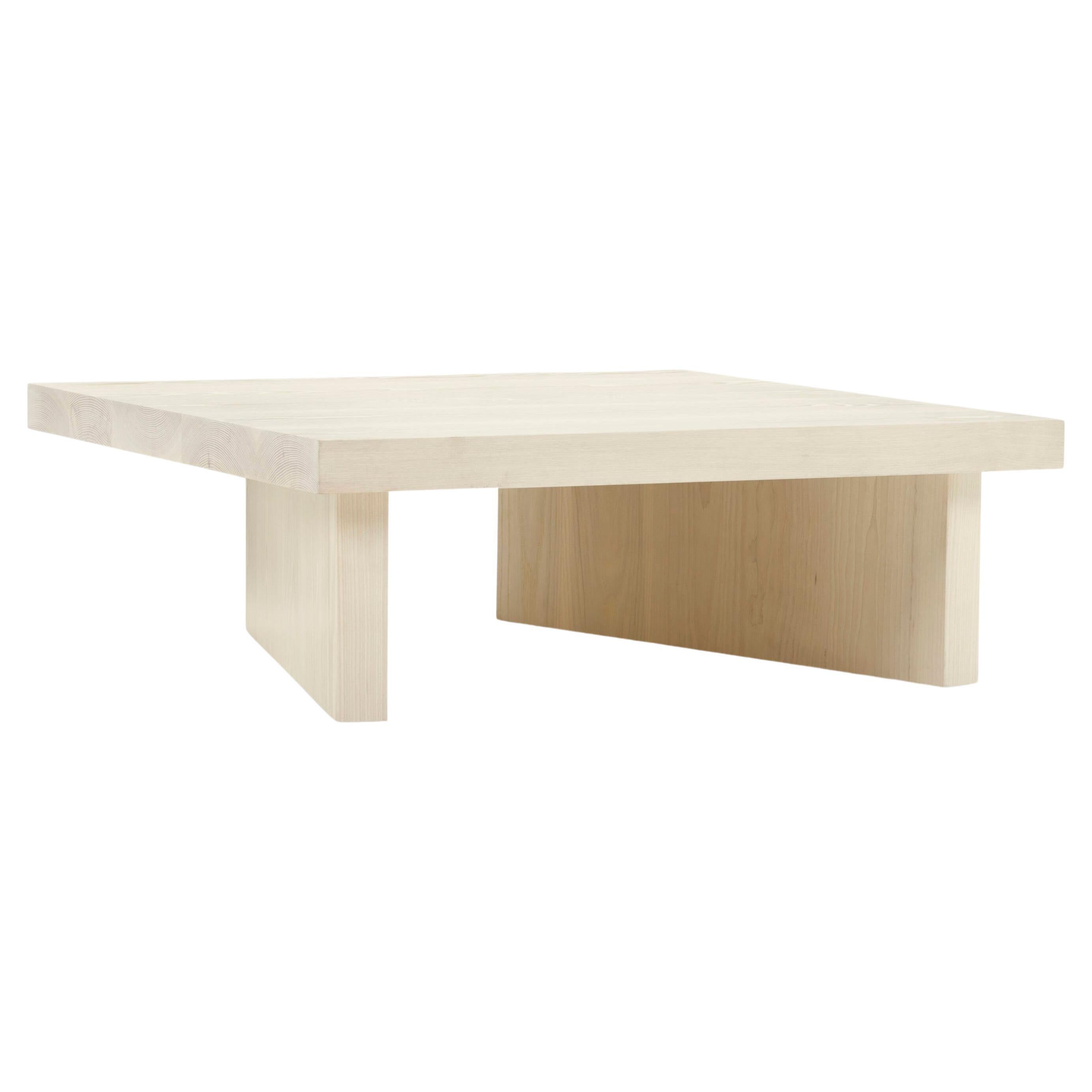 This Christian Woo's Diptiq Coffee Table is produced with 2.25” thick solid hardwood. Design features are guided by opposing interior planes and oversized proportions. The tables are constructed using internal joinery, and solid board length