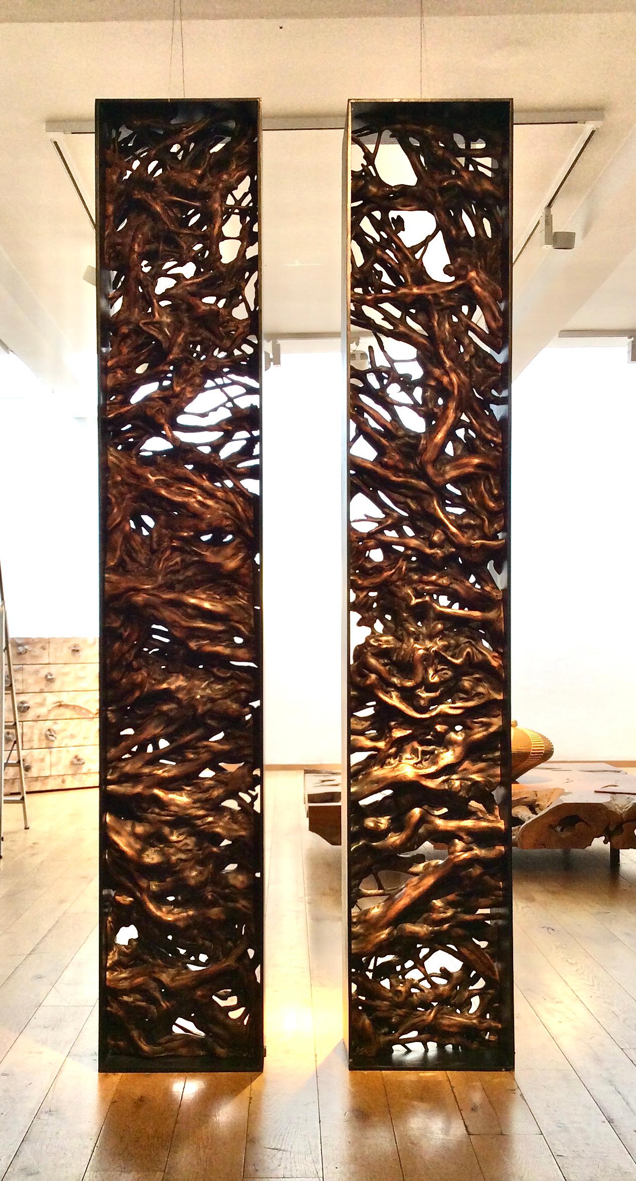Impressive pair of free standing organic sculptures of polished litchi roots, each in patinated iron frame.
Would be stunning as a room divider, providing textural interest and an engaging focal point.
 