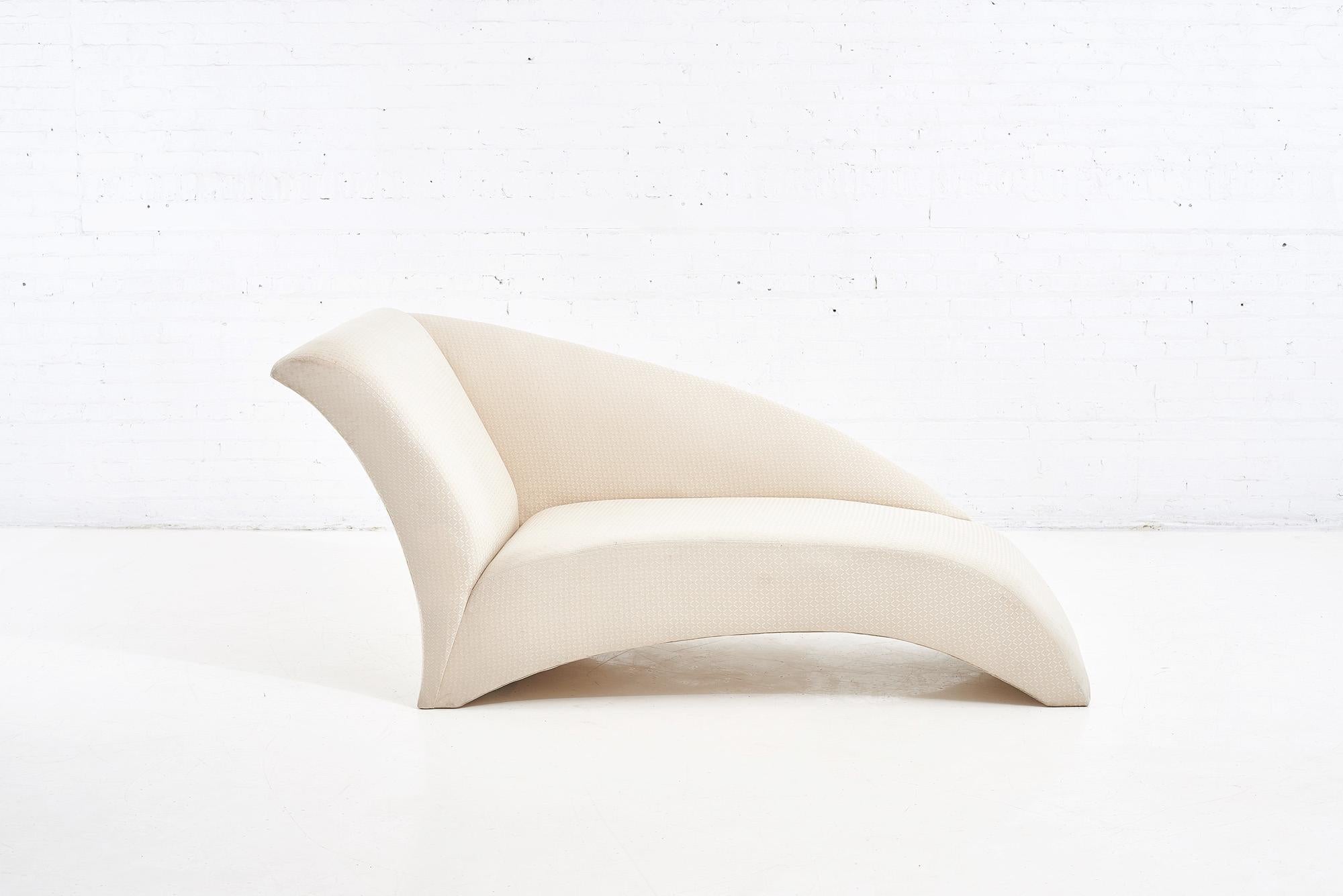 Directional chaise lounge by Vladimir Kagan.  Newly reupholstered in white boucle.