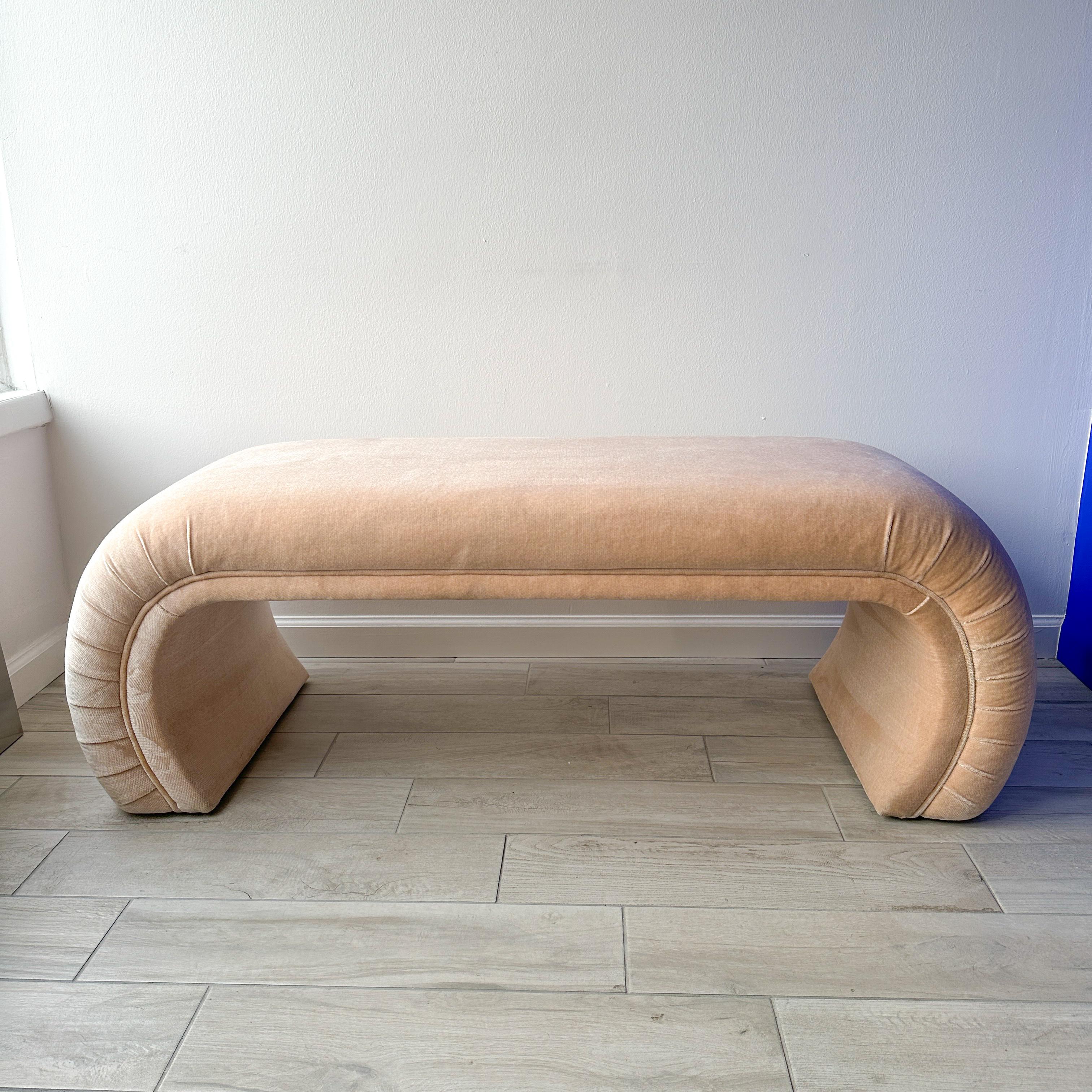 Vintage circa 1970s Directional curved waterfall bench covered in the original peach pink chenille fabric. Bench was located in guest room of estate and therefore was barely used. Recently professionally disinfected and steam cleaned. Bench was