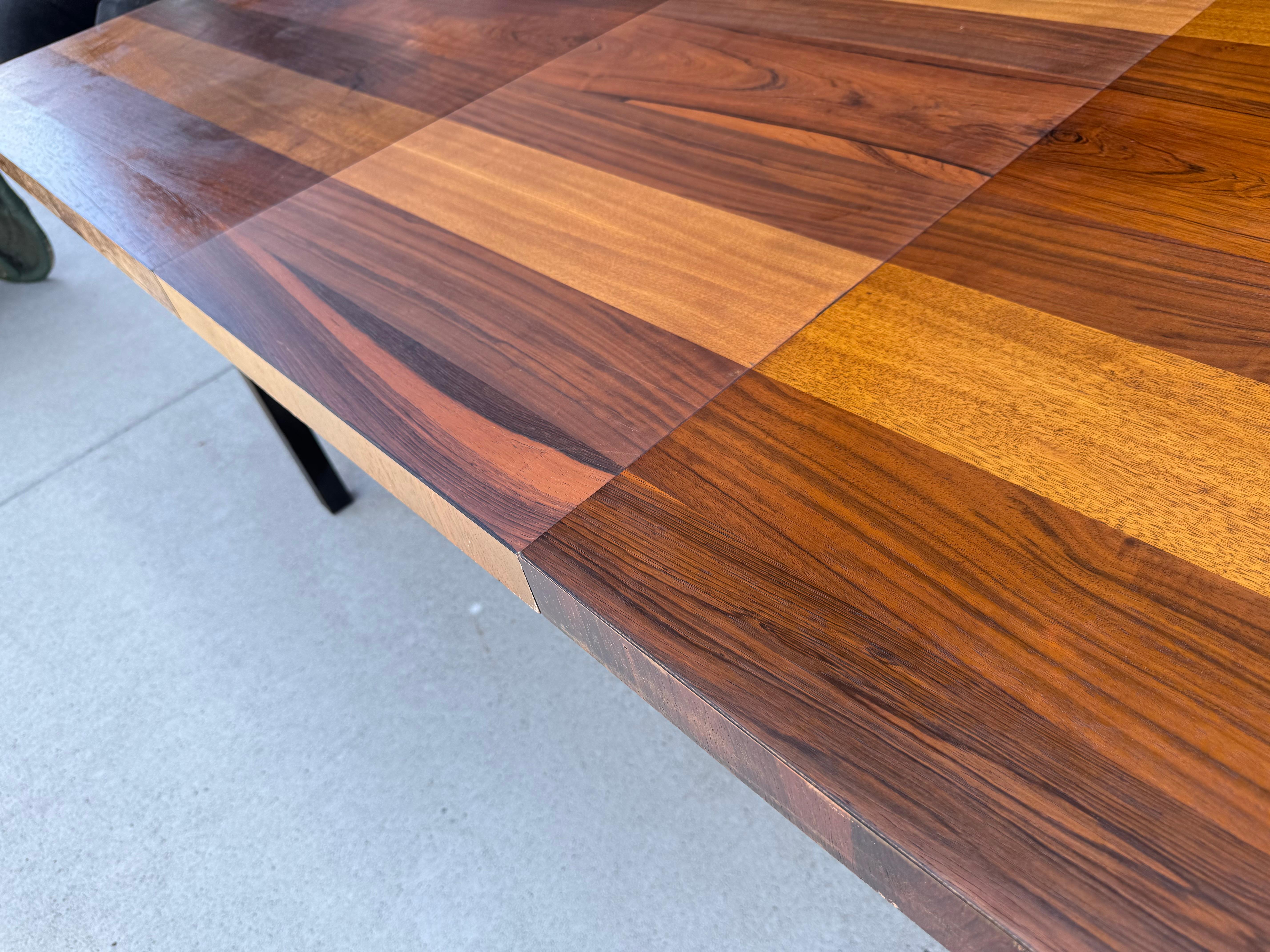 
Directional Dining Table designed by Milo Baughman. Classic Modernist Design.Consisting of mixed wood,, Rosewood ,, teak and Walnut... Retains original finish ,patina..Wear consistent of use and age .No major damage,, structurally sound,,, The