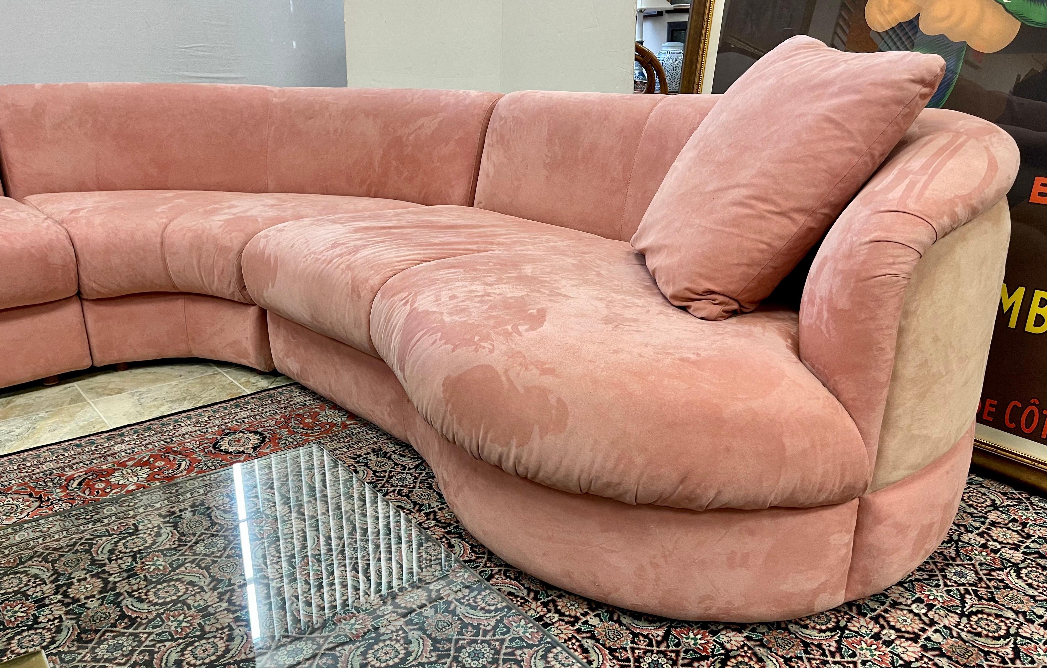 Elegant three piece sectional sofa from Directional Furniture, circa late 1970s-1980s. The fabric is a showstopper - rose colored suede and it features a subtle but stylish two-tone color scheme only on the back, of rose and tan. See all pictures.